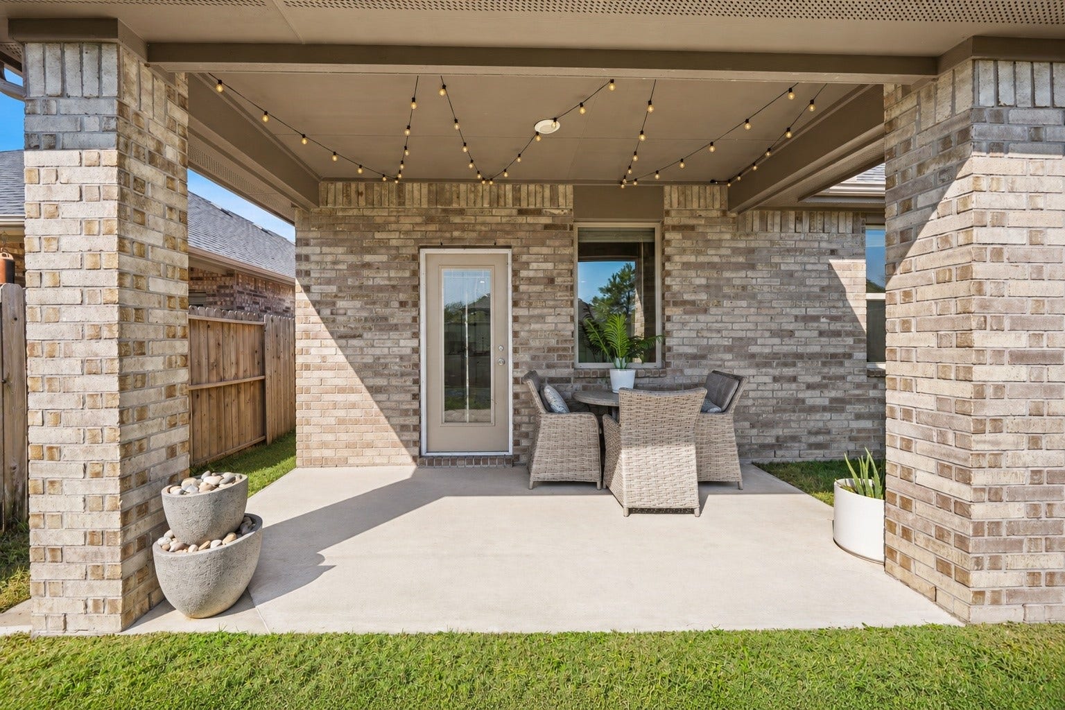 Enjoy the outdoors from your covered backyard patio, offering a relaxing space for morning coffee, weekend gatherings, or quiet evenings at home.

Virtually Enhanced