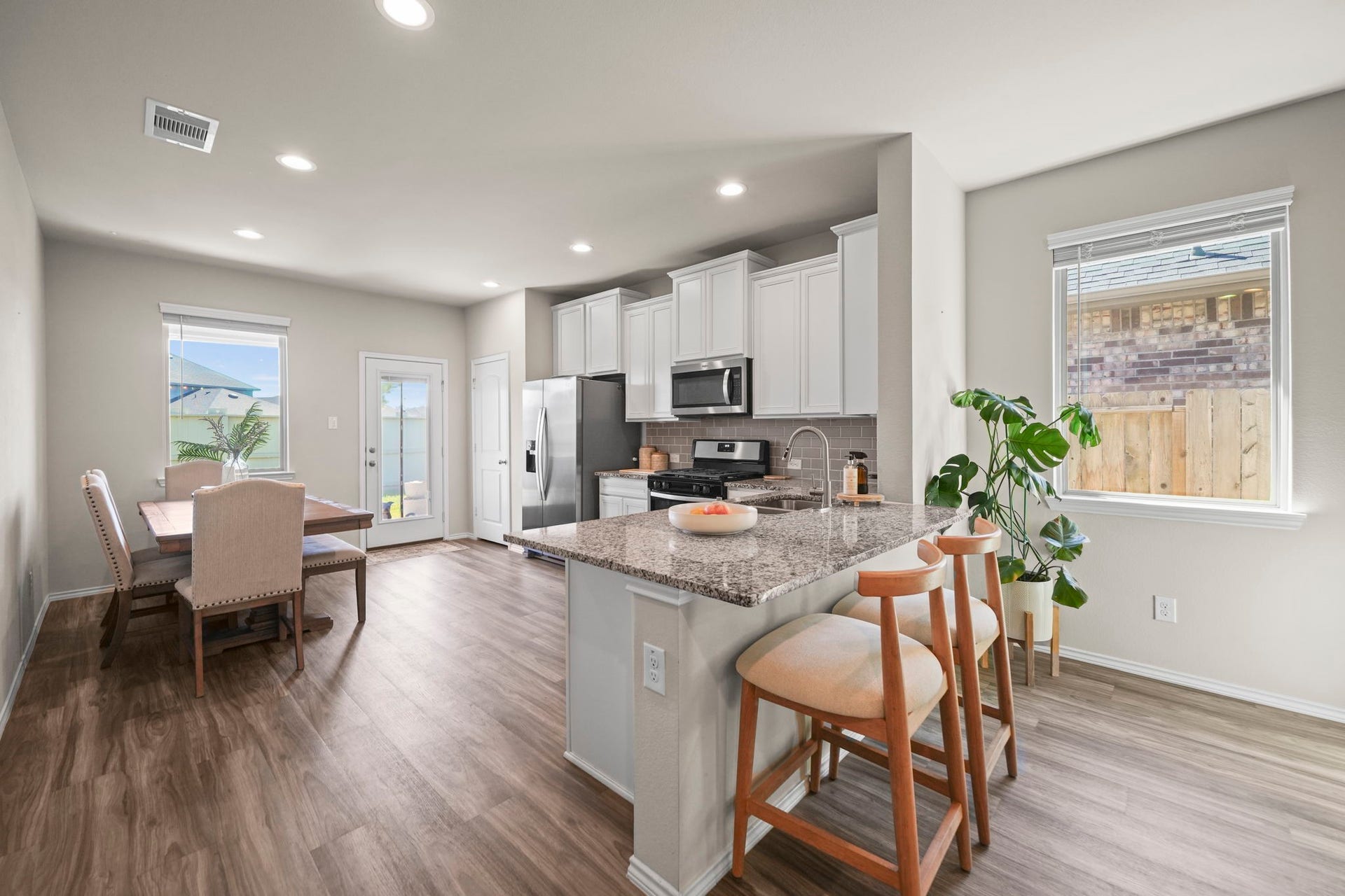Beautiful kitchen with generous counter space, a spacious island, and an open layout that makes cooking and entertaining effortless.
