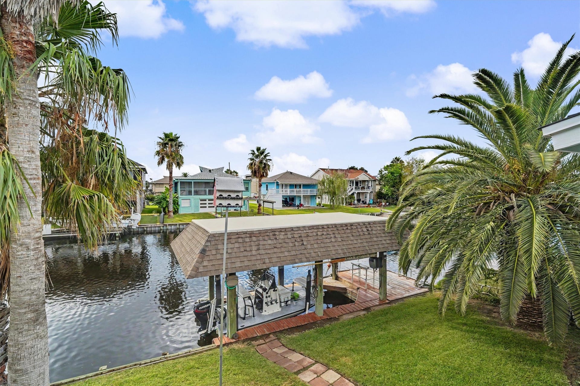 Keep your boat protected in your private boathouse and right at your fingertips! No hauling the boat to storage, no extra tripsjust step outside, lower the lift, and you're ready for your next waterfront adventure