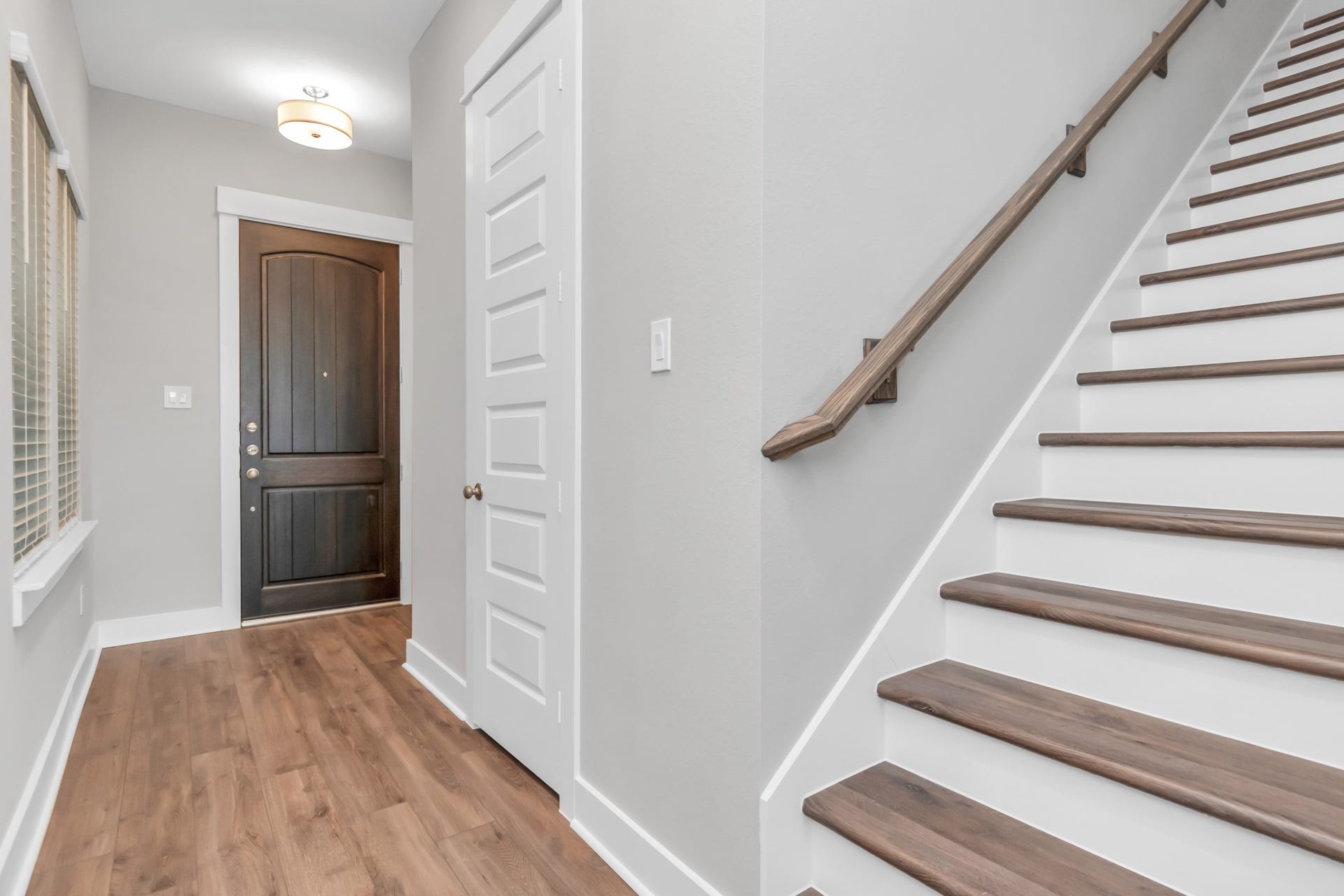 Gorgeous Wood-Like Stairs Leading to the Second Floor.