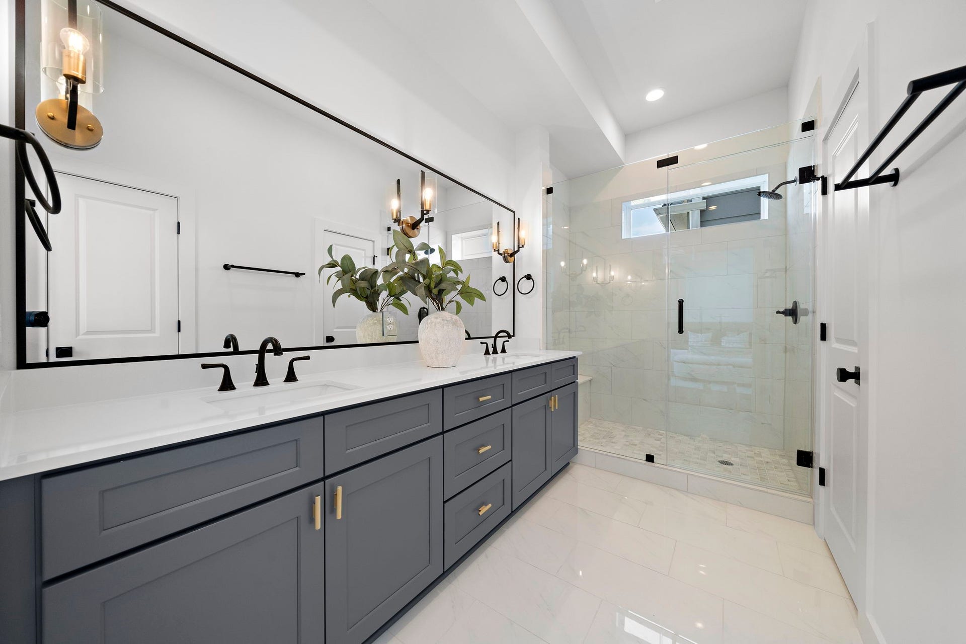 835 Elkhart Street, #E, Houston, TX 77091 Primary Bathroom with dual vanities and and oversized glass walk-in shower.