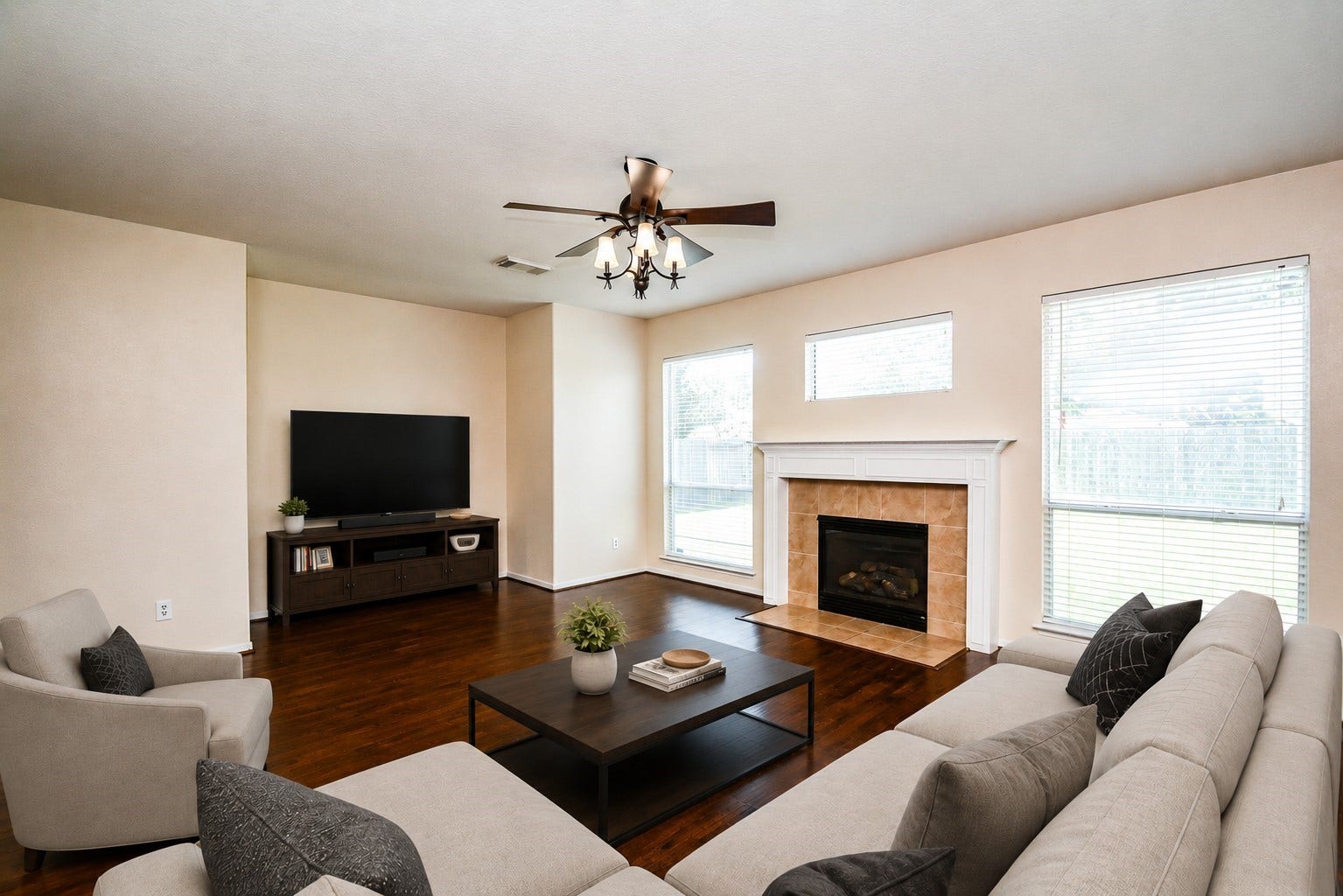 18507 Lodgepole Pine Street, Cypress, TX 77429 Spacious family room with fireplace and lots of natural light and beautiful flooring *virtually staged*