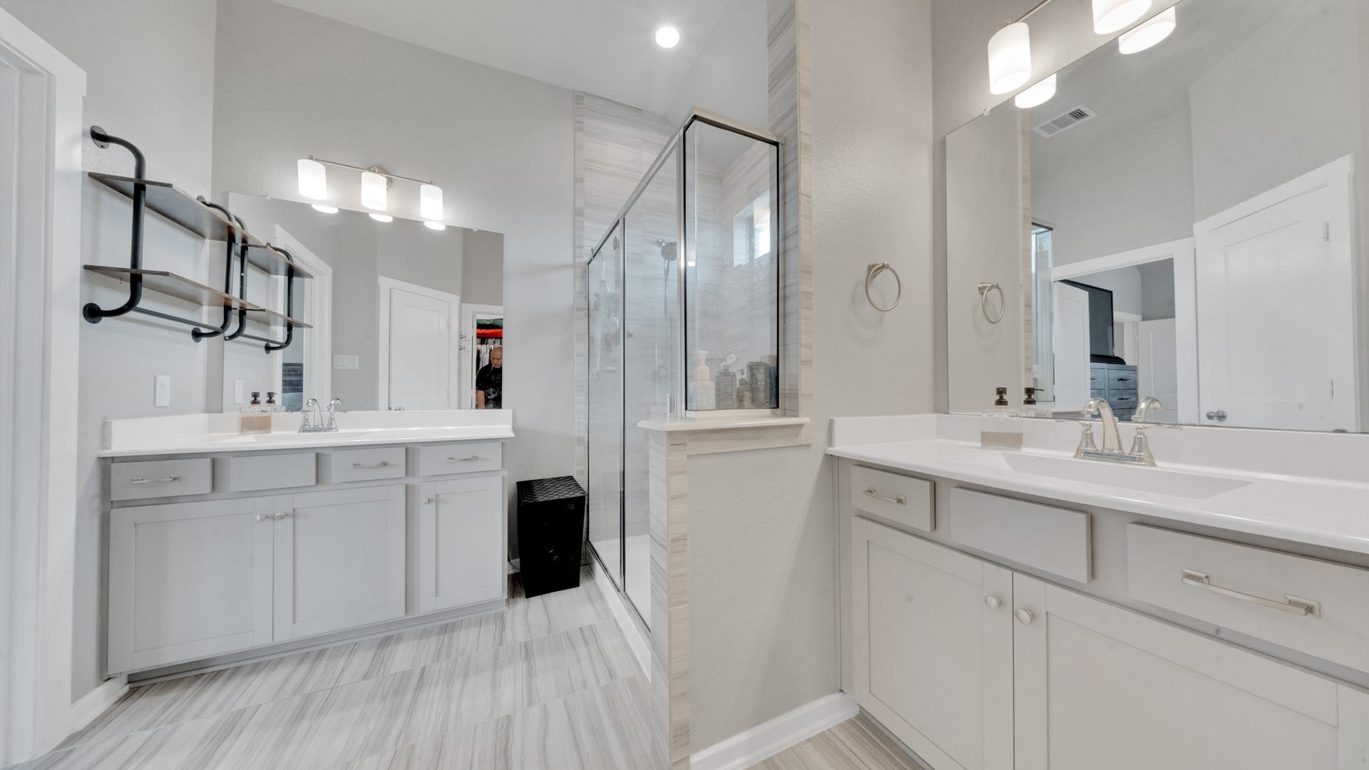6123 Dovetail Cliff Court, Katy, TX 77493 Large walk-in shower with modern tile surround and generous vanity space for added convenience.
