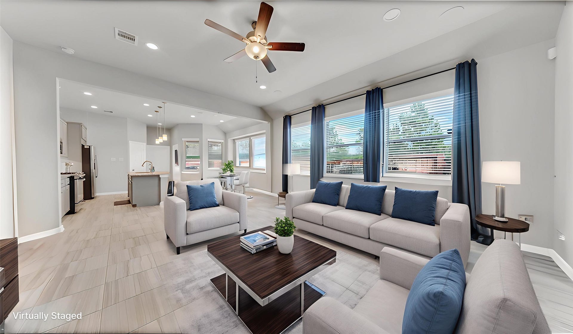 6123 Dovetail Cliff Court, Katy, TX 77493 Open-concept living room with abundant natural light, perfect for modern living.