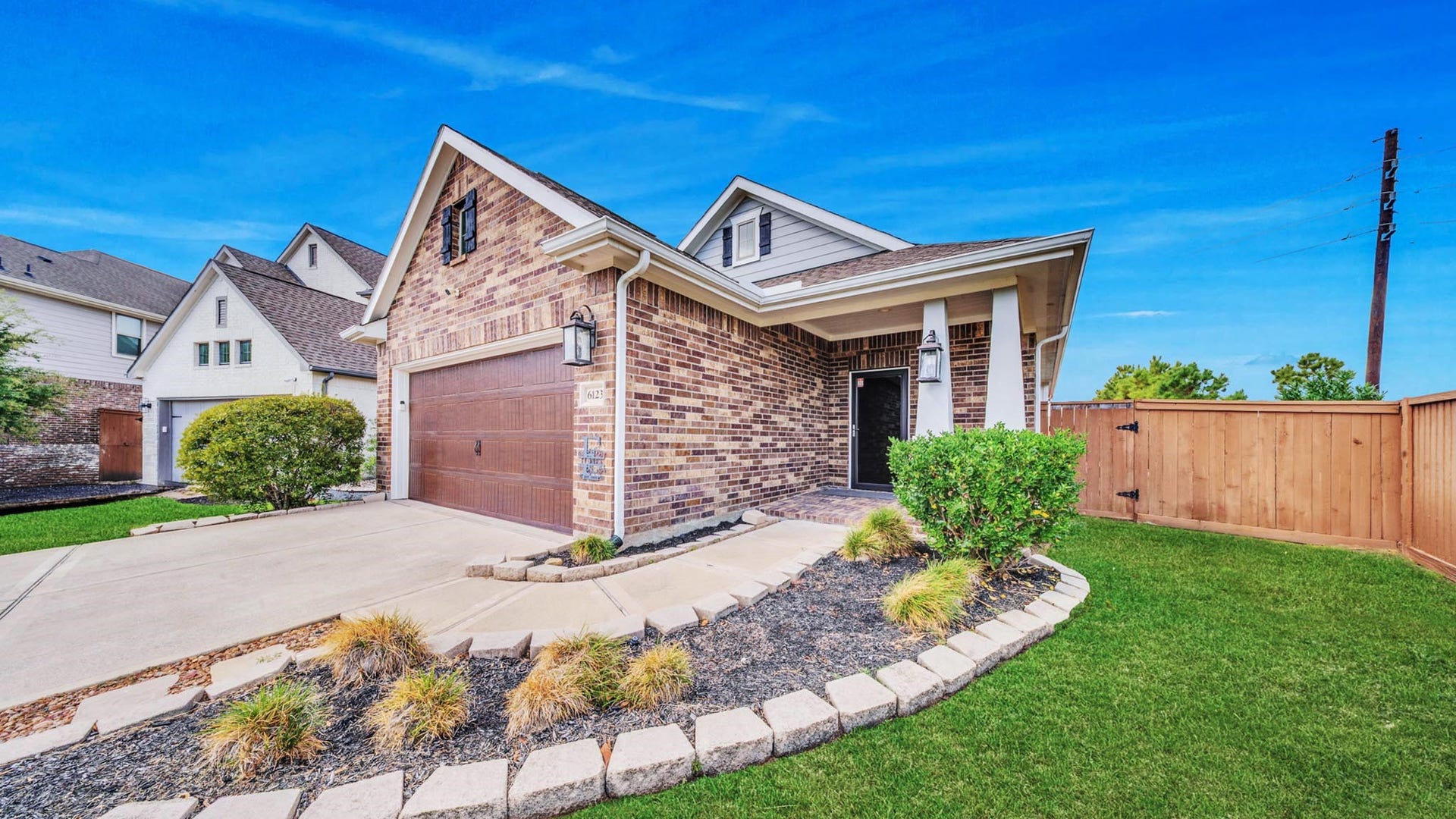 6123 Dovetail Cliff Court, Katy, TX 77493 Charming brick exterior with great curb appeal located on a quiet cul-de-sac in Elyson.
