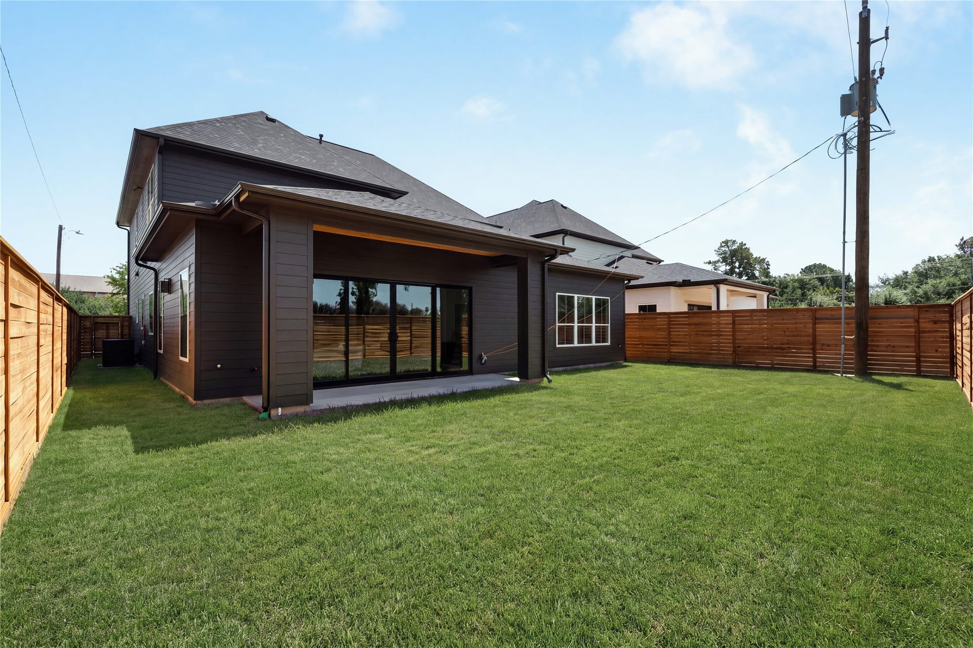 2109 McKean Drive, Houston, TX 77080 The oversized 30' x 60' backyard offers exceptional space for a future pool, play lawn, or custom outdoor retreat, all enclosed by a 7-foot cedar privacy fence.