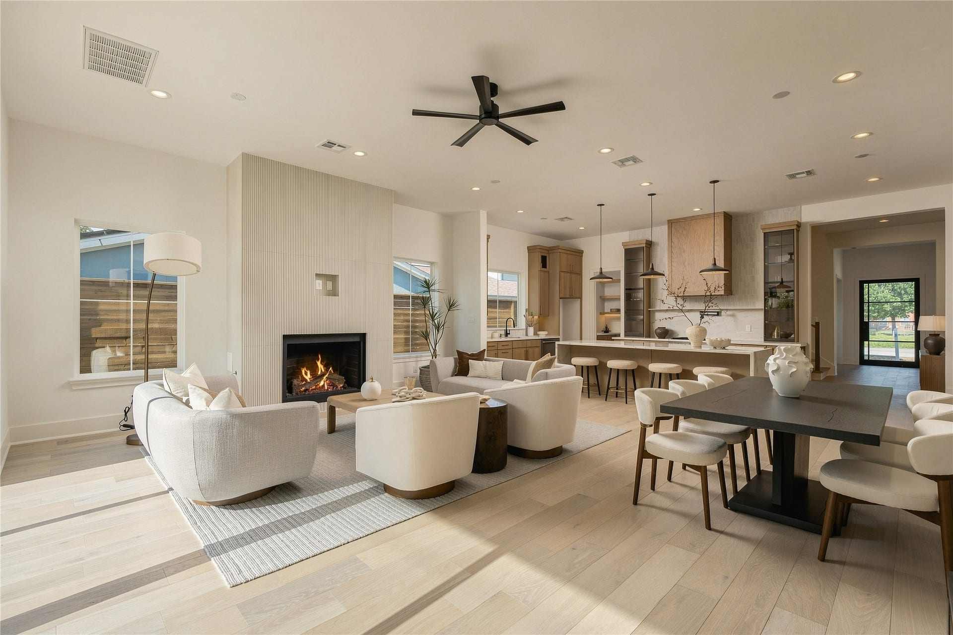 2109 McKean Drive, Houston, TX 77080 From this perspective, the homes open-concept design comes fully into view, connecting the living, dining, and kitchen areas into one expansive setting designed for everyday life and larger gatherings alike.