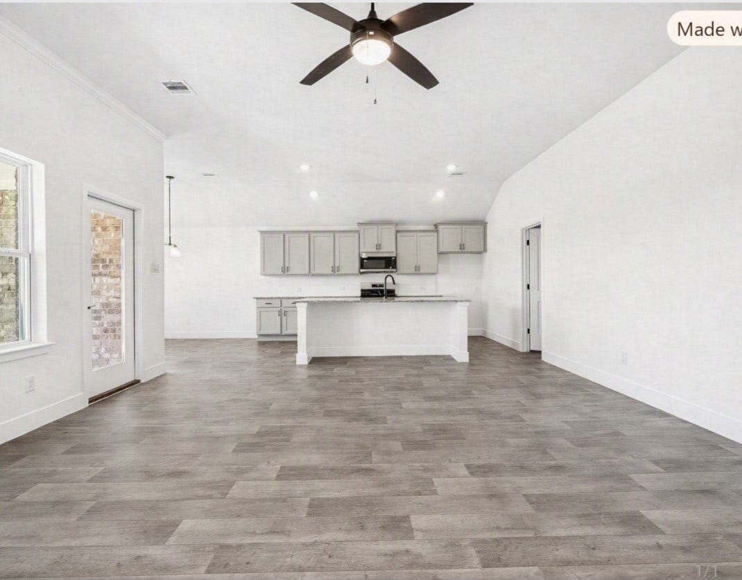 4206 Leslies Way, Dickinson, TX 77539 Stock photo / over sized open kitchen and living