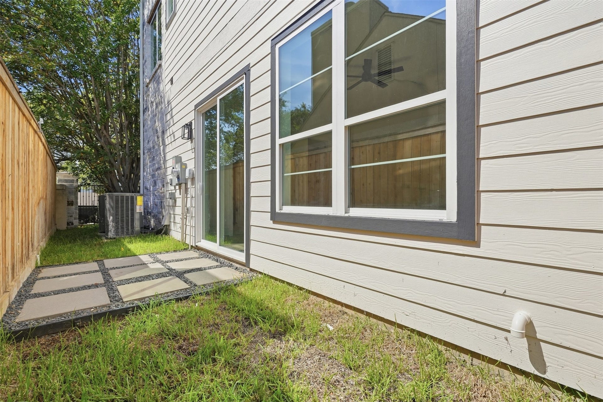2111 Nantucket Drive, #D, Houston, TX 77057 A private fenced outdoor space creates an easy extension of the home for morning coffee, a quiet evening outside, or a comfortable spot to unwind.