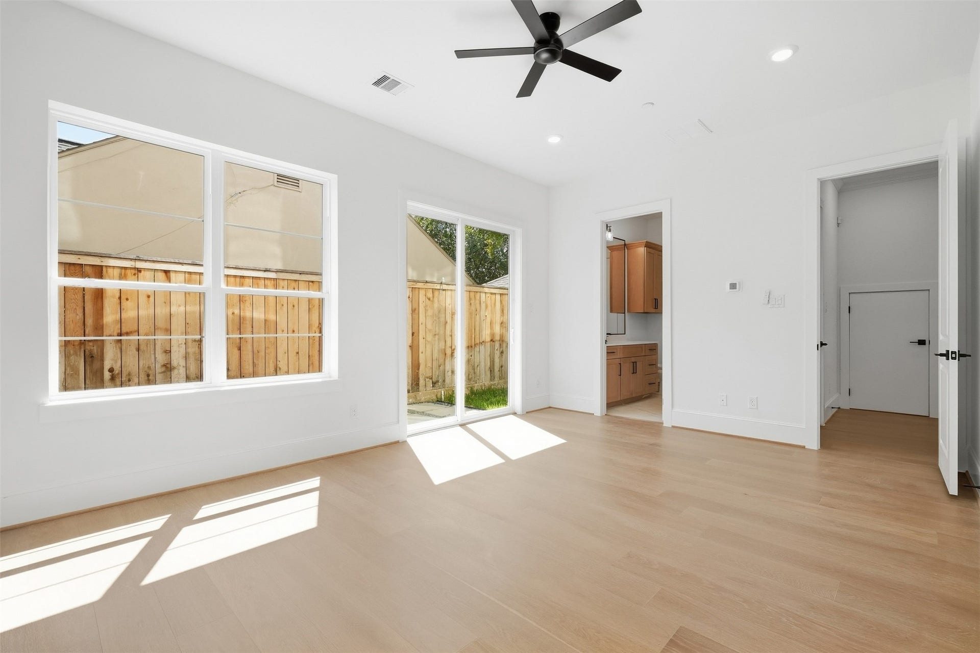 2111 Nantucket Drive, #D, Houston, TX 77057 Generously sized and filled with natural light, this flexible first-floor space can easily serve as a private bedroom, study, or home office.