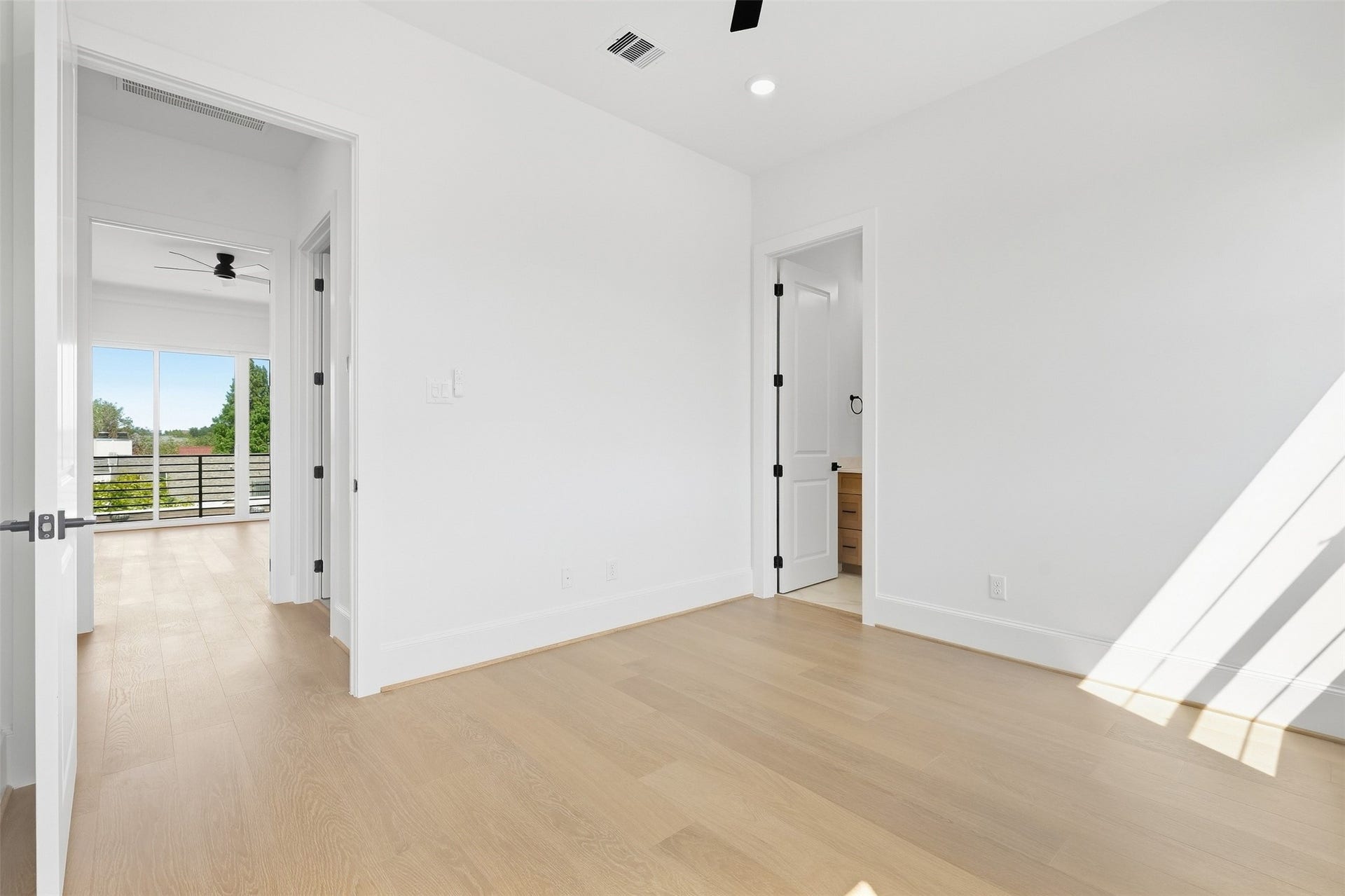 2111 Nantucket Drive, #D, Houston, TX 77057 Another view of the secondary bedroom highlights its comfortable proportions and convenient placement near the primary suite.
