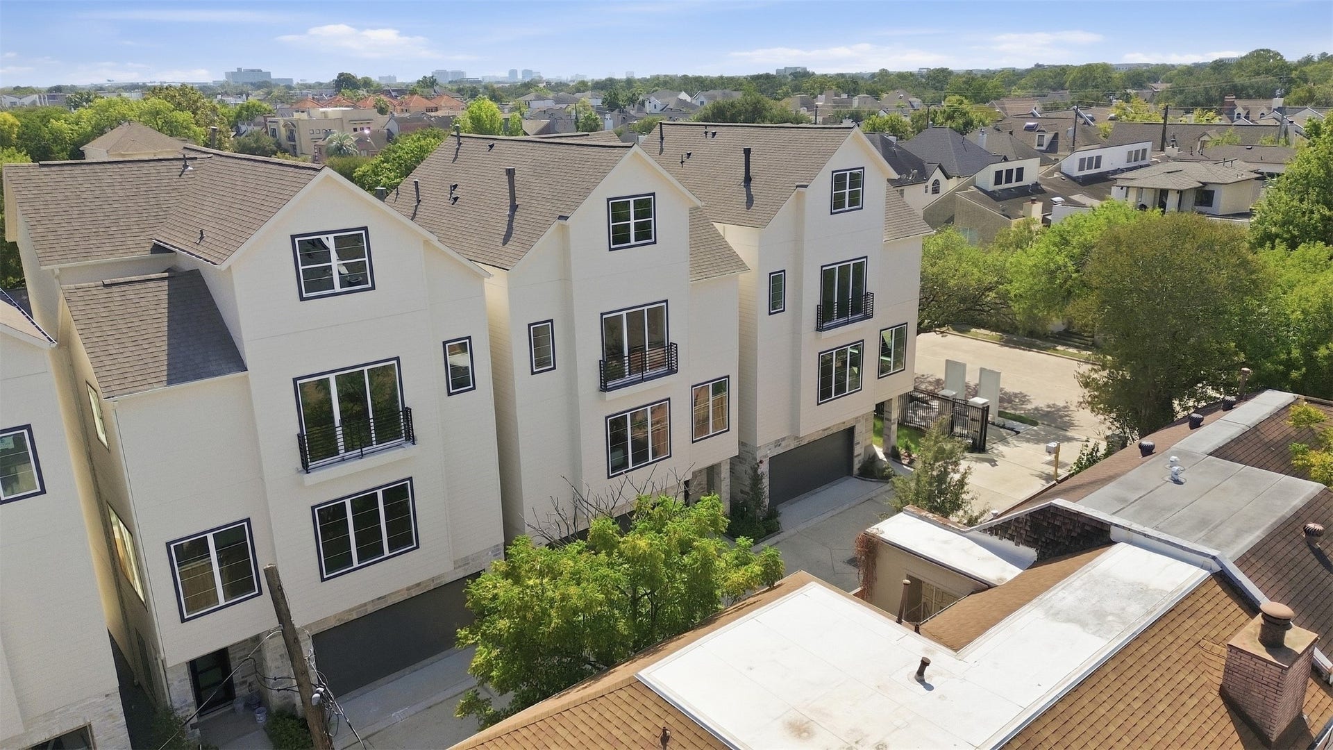 2111 Nantucket Drive, #D, Houston, TX 77057 Elevated aerial view highlighting the intimate four-residence development and its established surrounding neighborhood, conveniently located near some of Houstons premier shopping, dining, and entertainment.