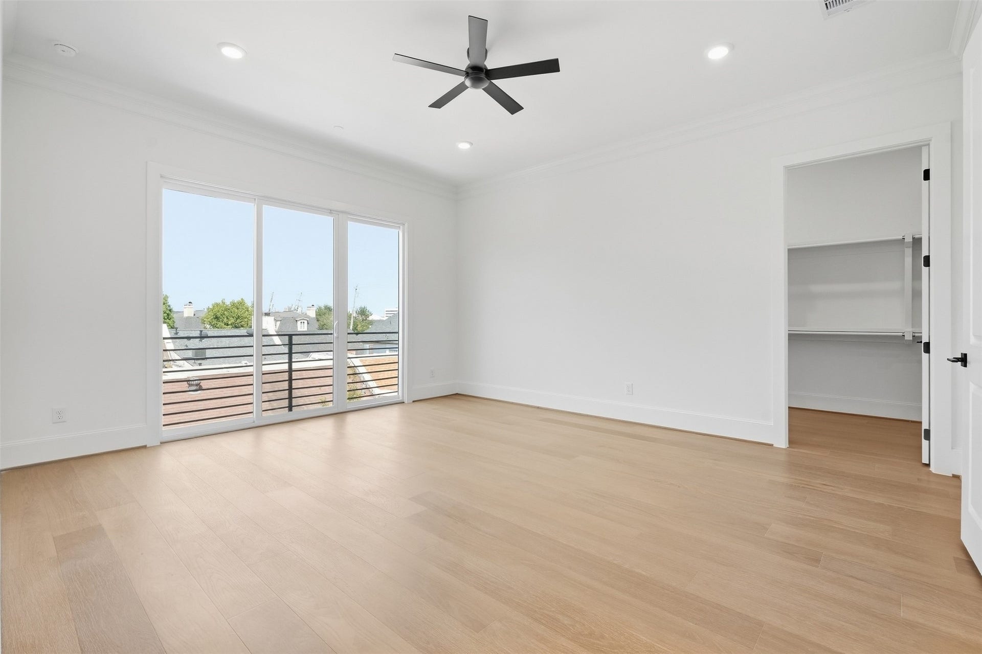 2111 Nantucket Drive, #D, Houston, TX 77057 A serene primary suite is filled with natural light and offers generous proportions, a large walk-in closet, and a private setting designed to feel like a true retreat.