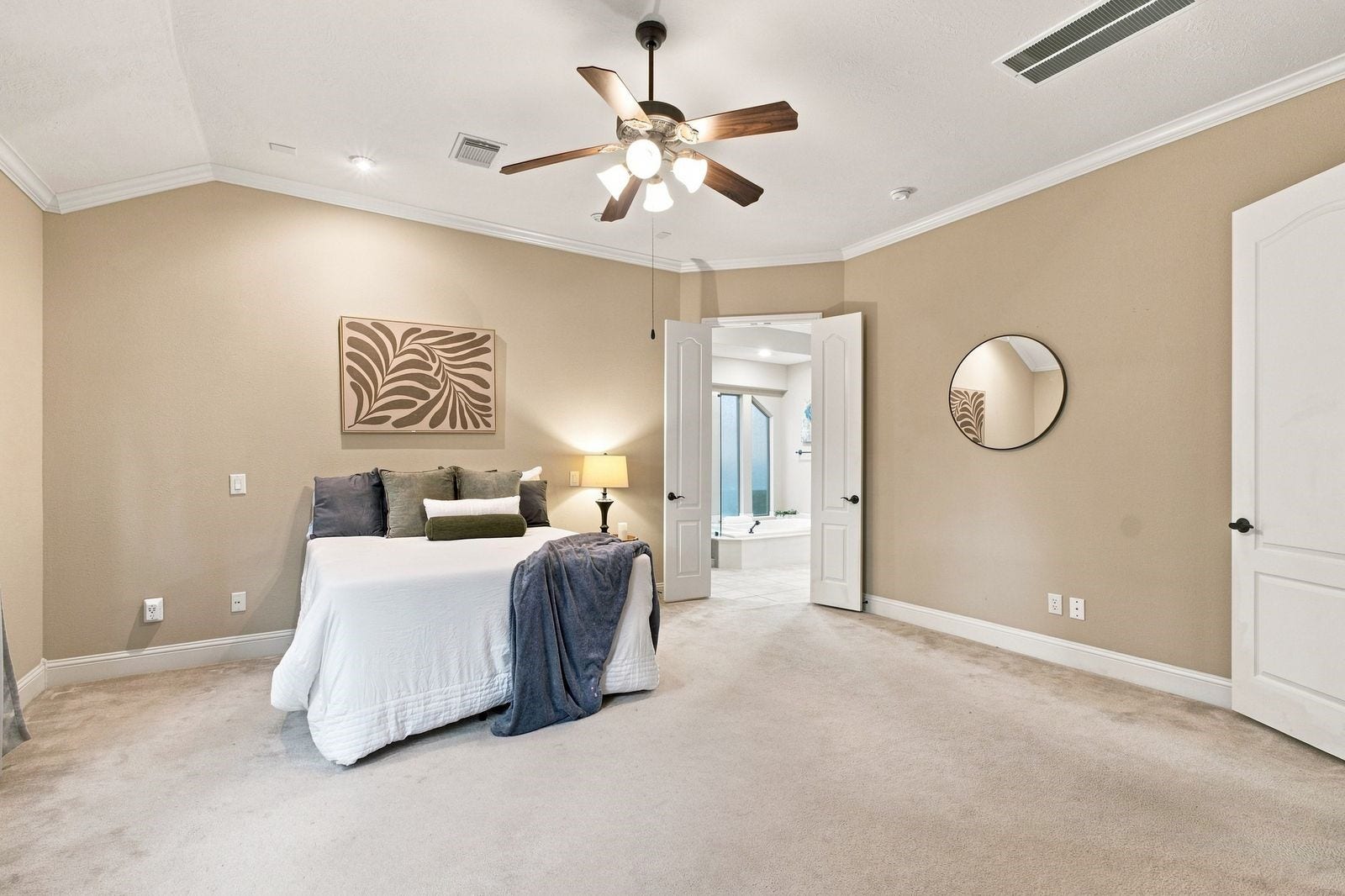 The primary is expansive and separate from the rest of the home.