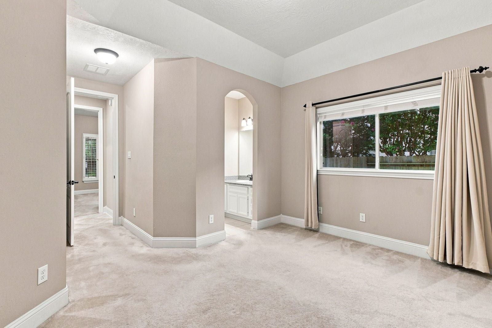 Bedroom 2 overlooks the massive side yard and has a jack and Jill bathroom attached.