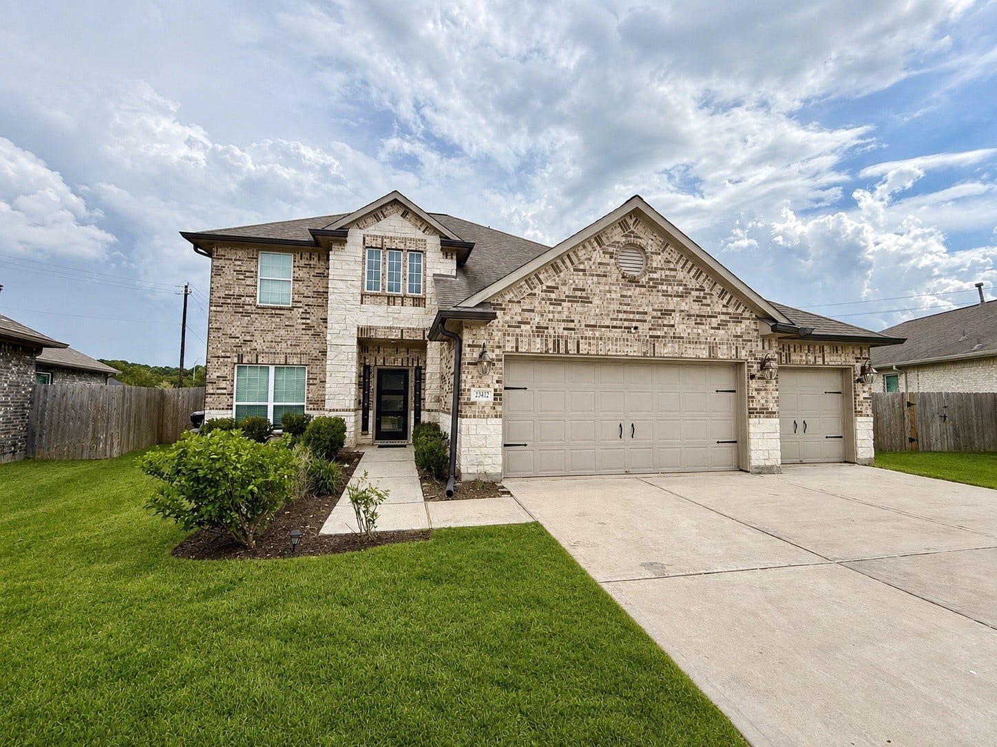 23422 Bordeaux Drive, Alvin, TX 77511 Exterior of home with 3 car garage.
