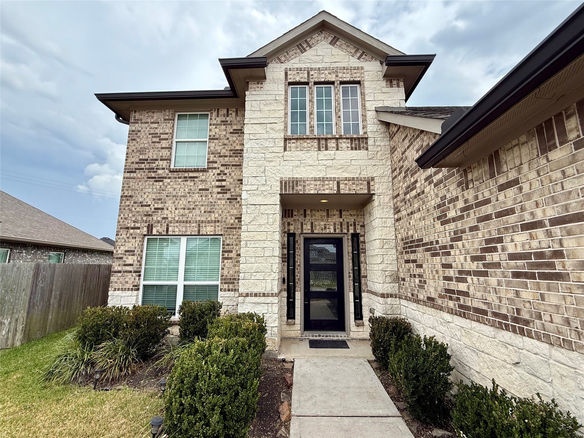 23422 Bordeaux Drive, Alvin, TX 77511 Beautiful entry with modern front door.