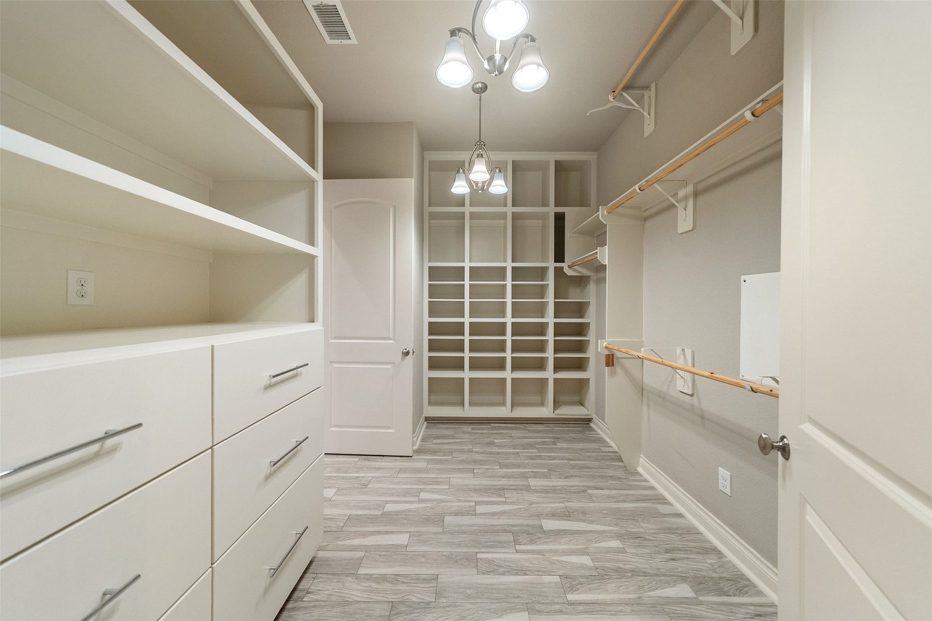 Walk-in closet with built-in's.