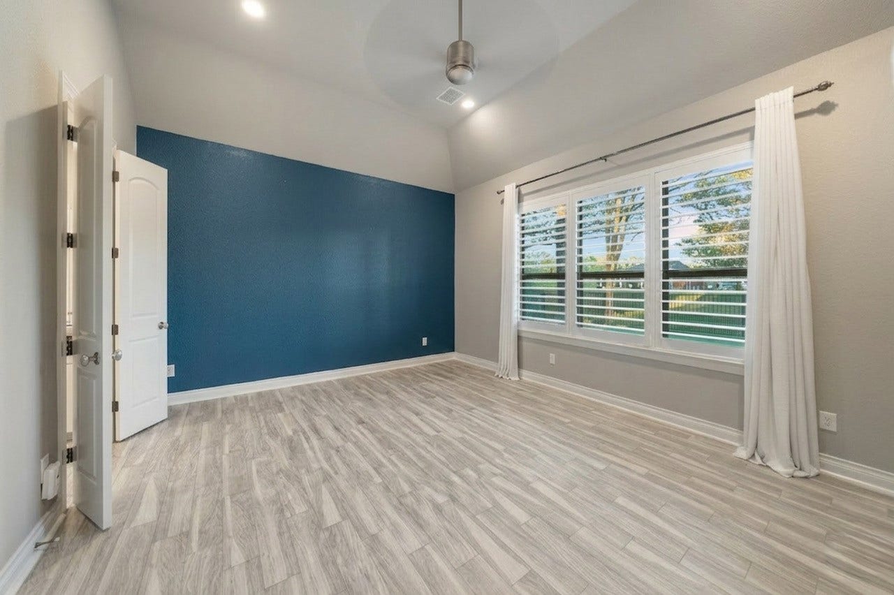 Primary suite with golf course views.
