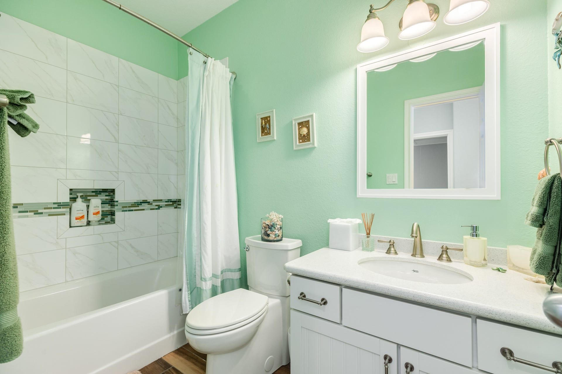 18502 E De Vaca, Galveston, TX 77554 Ensuite bathroom to bedroom #3 with tub/shower arrangement.