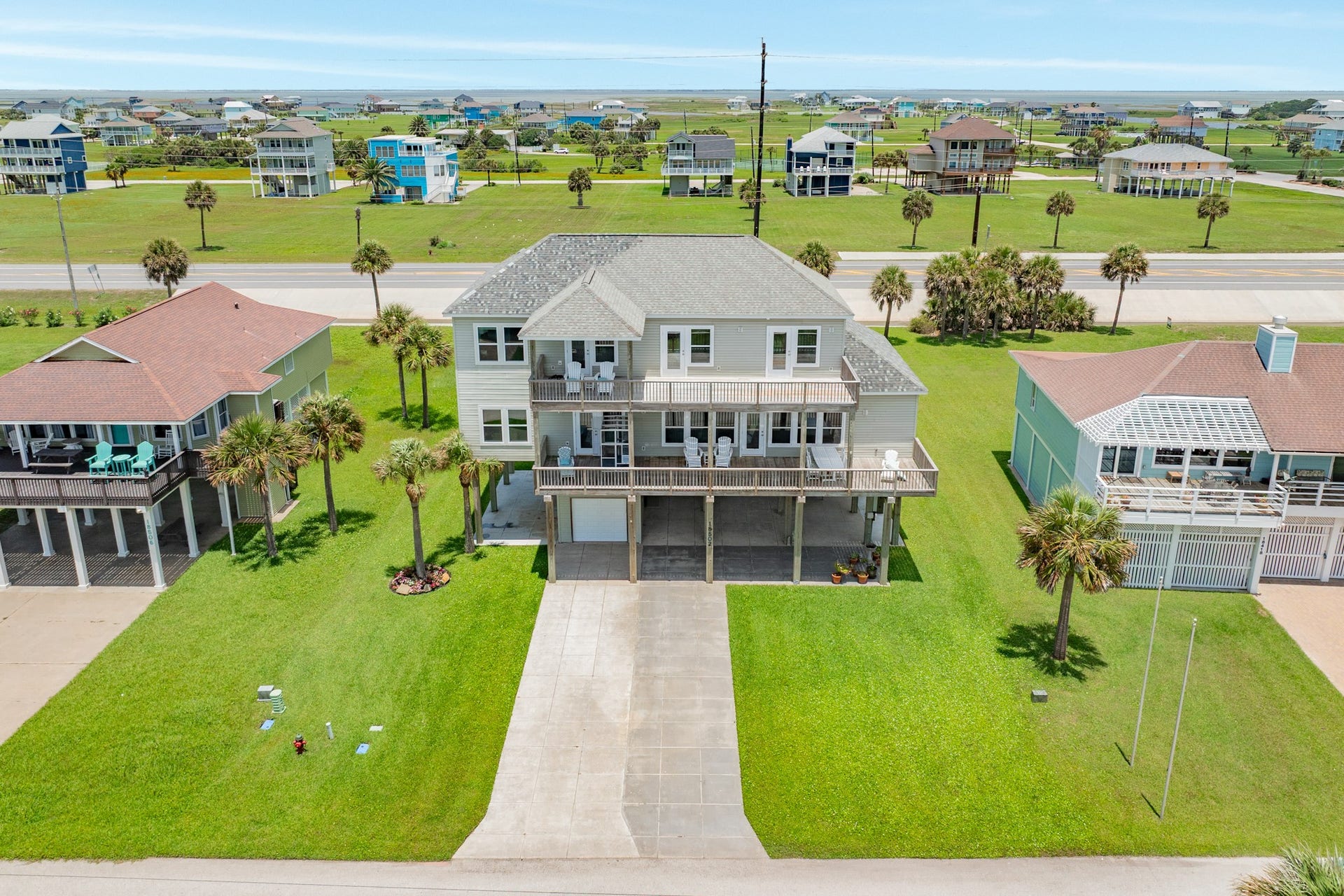 18502 E De Vaca, Galveston, TX 77554 Aerial view of home, come by and see this home in person soon.