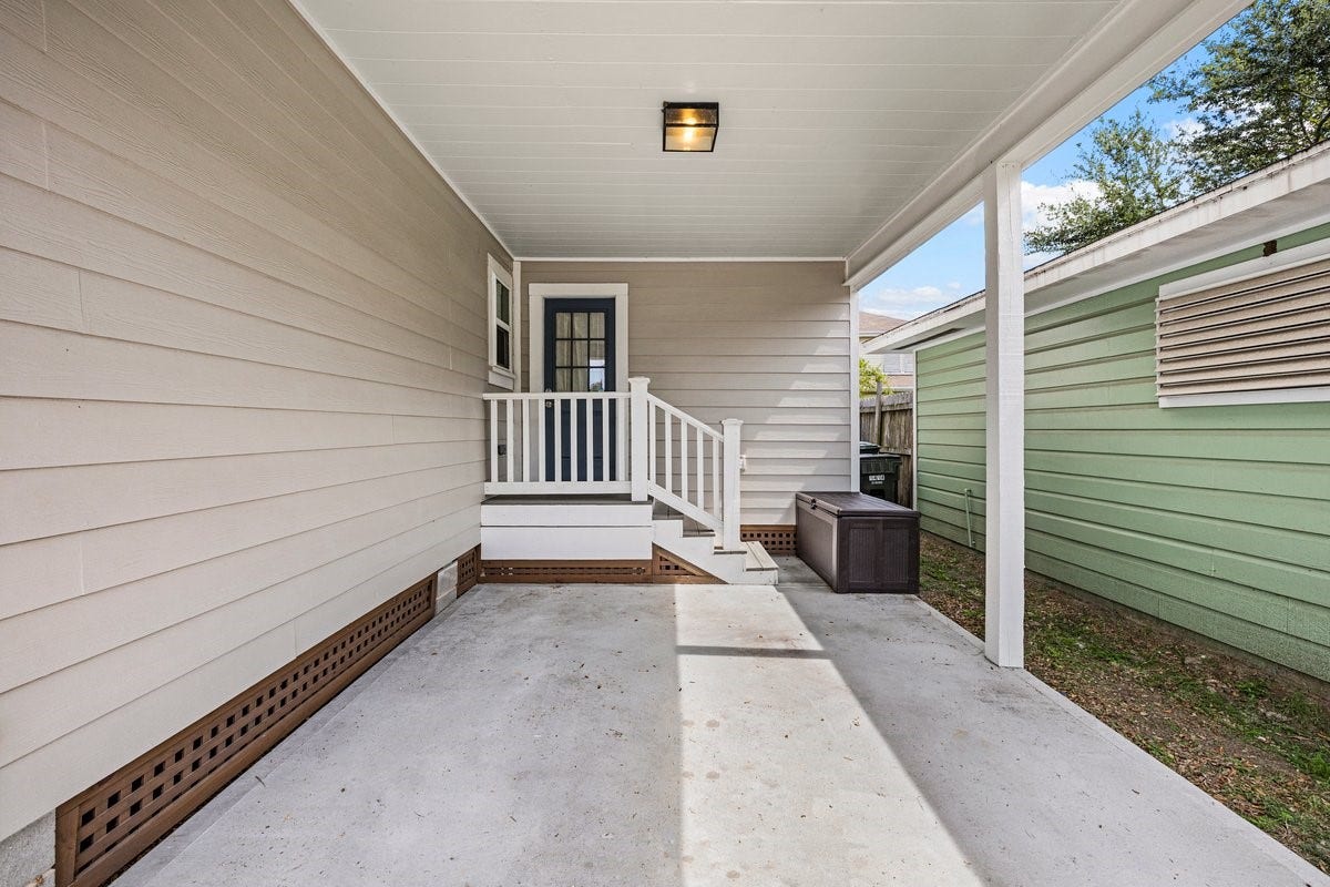 1414 29th Street, Galveston, TX 77550 Covered Carport area with 2nd entrance right off the kitchen