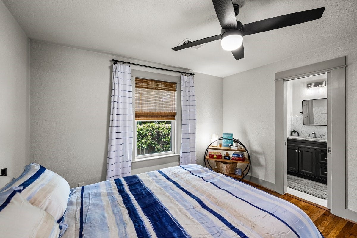 1414 29th Street, Galveston, TX 77550 Spacious guest bedroom with private ensuite bathroom.
