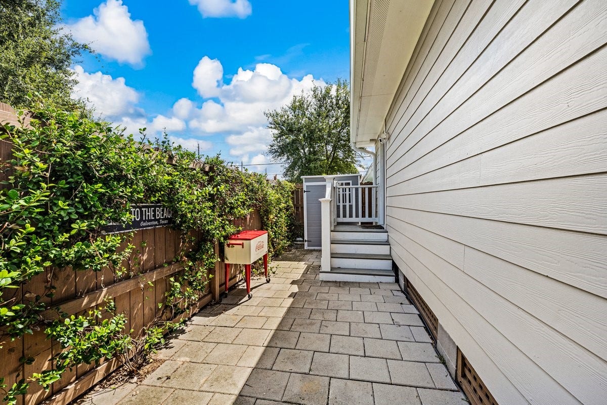 1414 29th Street, Galveston, TX 77550 Inviting outdoor patio perfect for BBQs, grilling, and entertaining at 1414 29th Street in Galveston, TX.