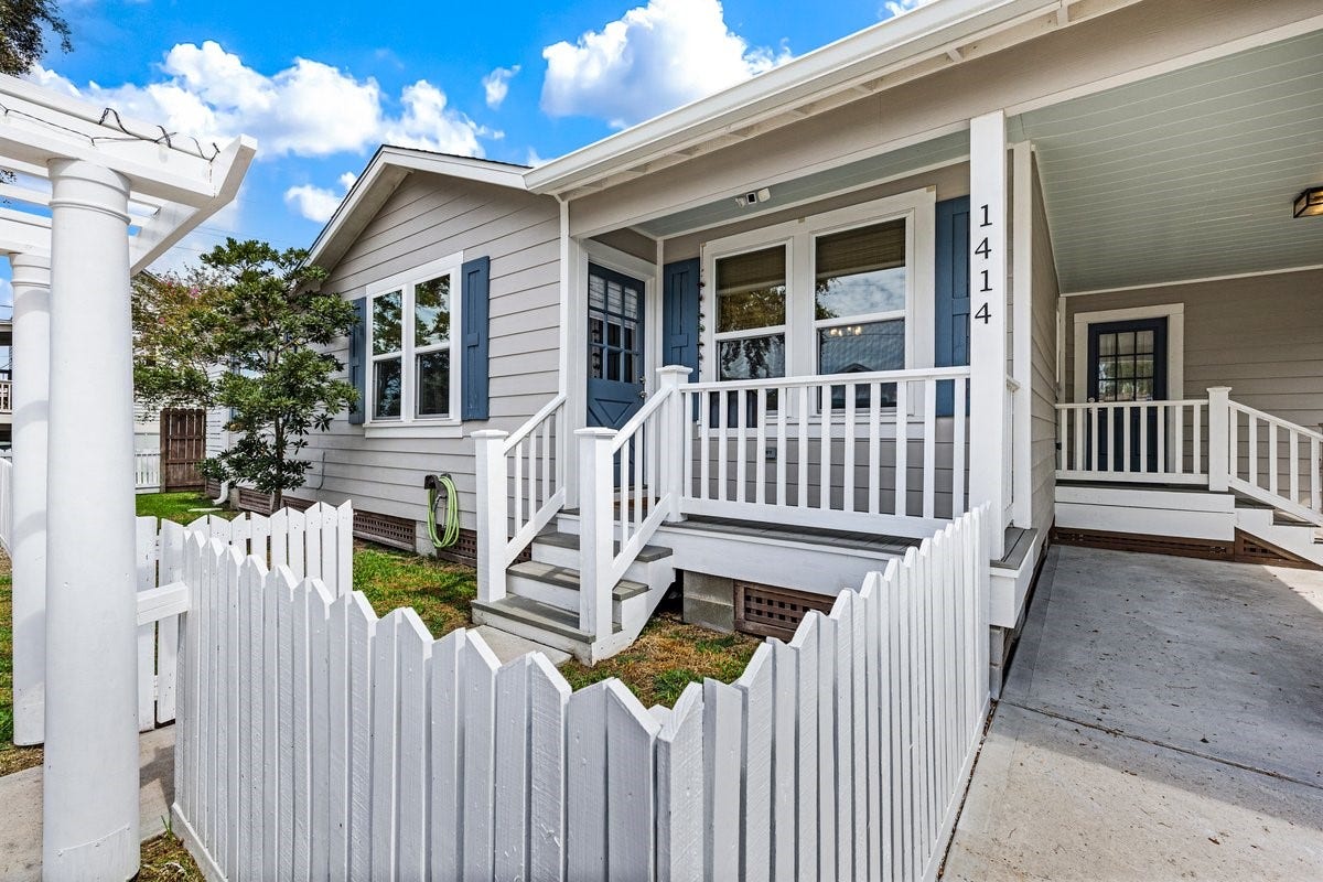 1414 29th Street, Galveston, TX 77550 Charming white picket fence adds timeless curb appeal