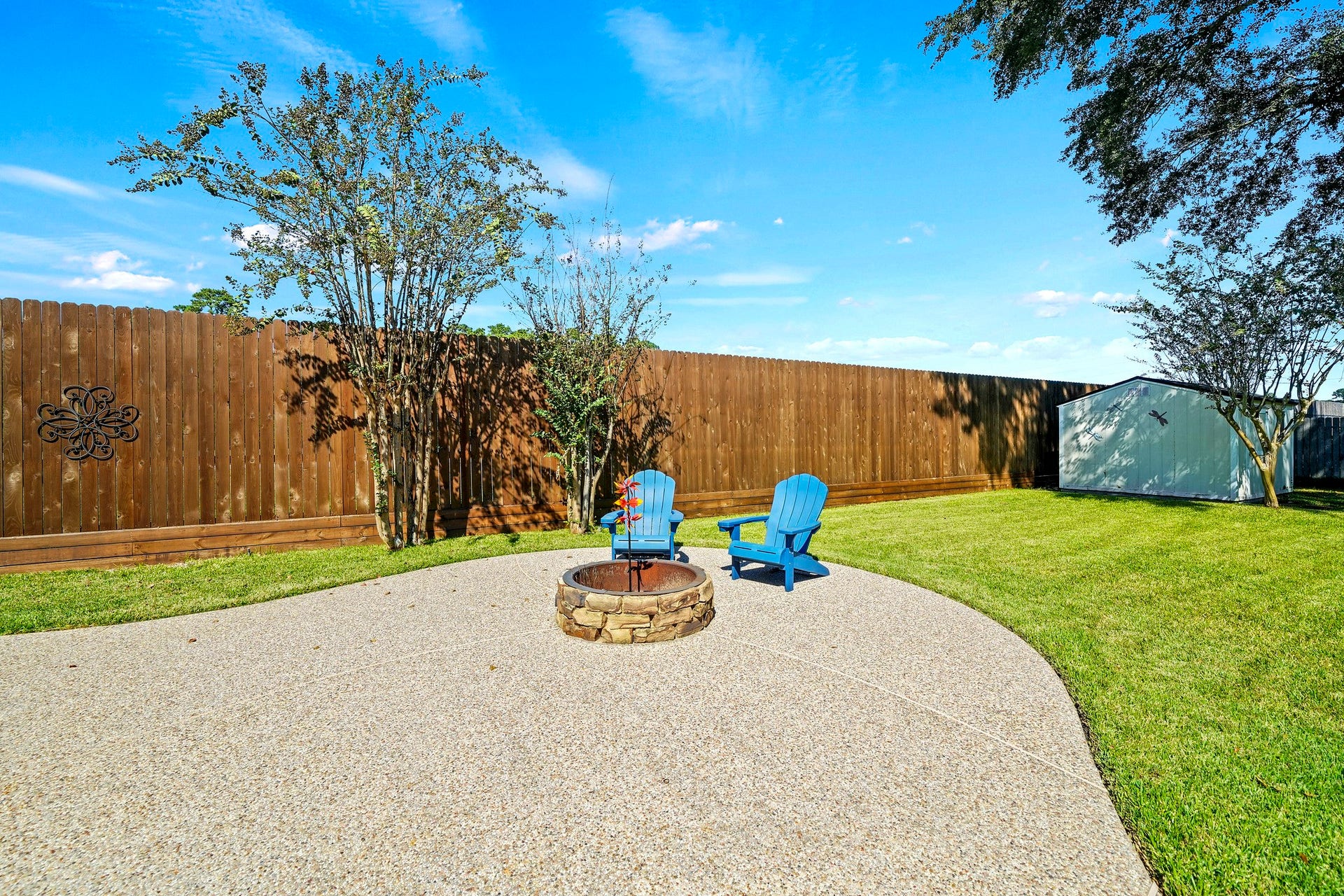 1806 Kensington Park Circle, Spring, TX 77386 Inviting backyard fire pit.