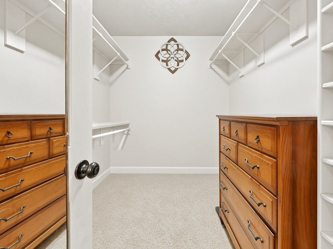 1806 Kensington Park Circle, Spring, TX 77386 Generous primary walk-in closet. Virtually staged.