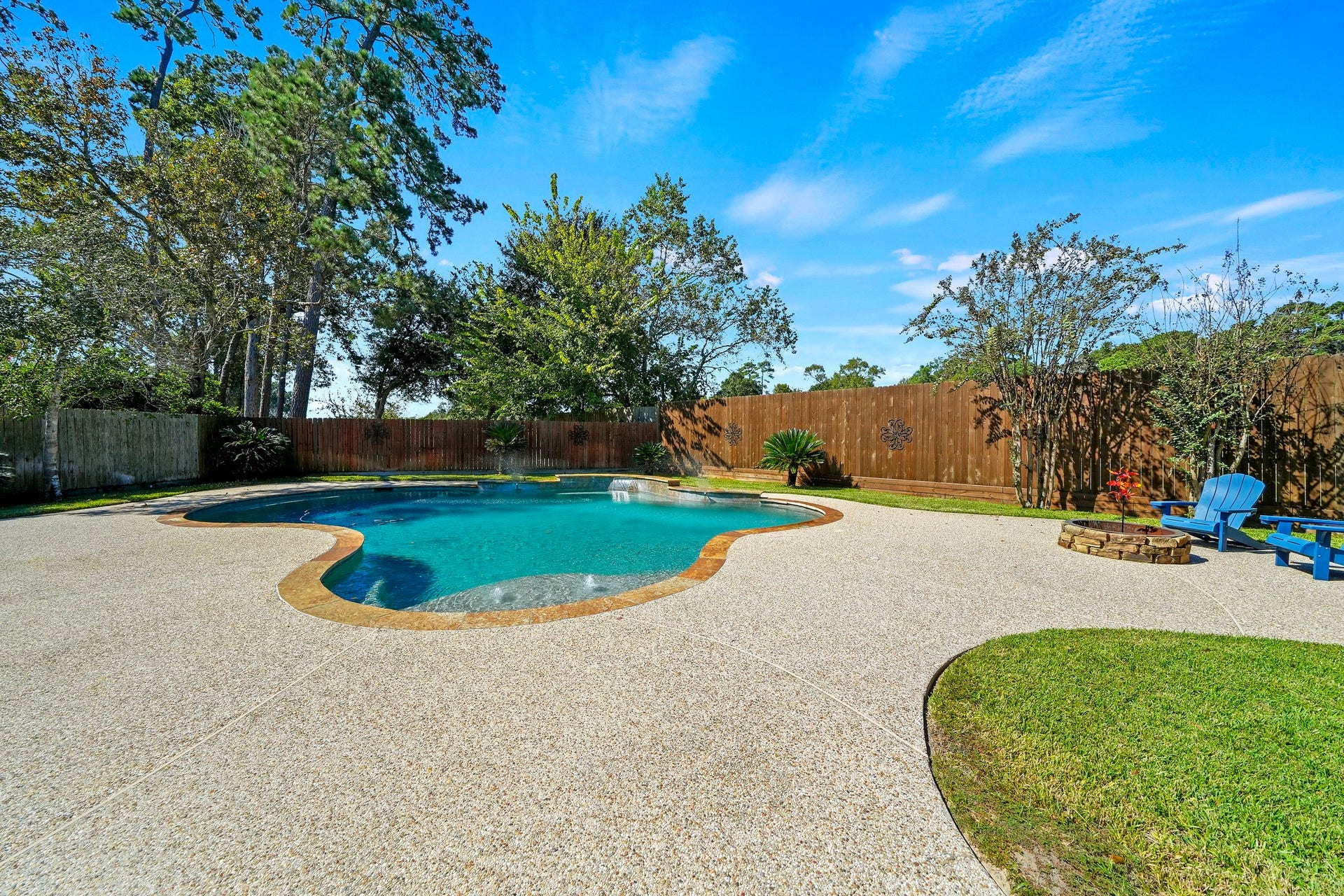 1806 Kensington Park Circle, Spring, TX 77386 Sparkling free-form pool and deck.