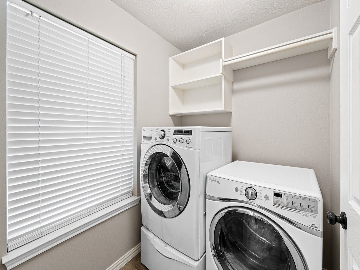 1806 Kensington Park Circle, Spring, TX 77386 Convenient laundry room with extra storage. Virtually staged.