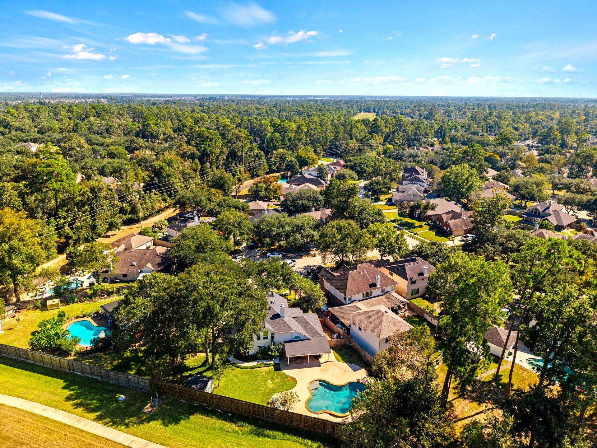 1806 Kensington Park Circle, Spring, TX 77386 Aerial view of the home and backyard.
