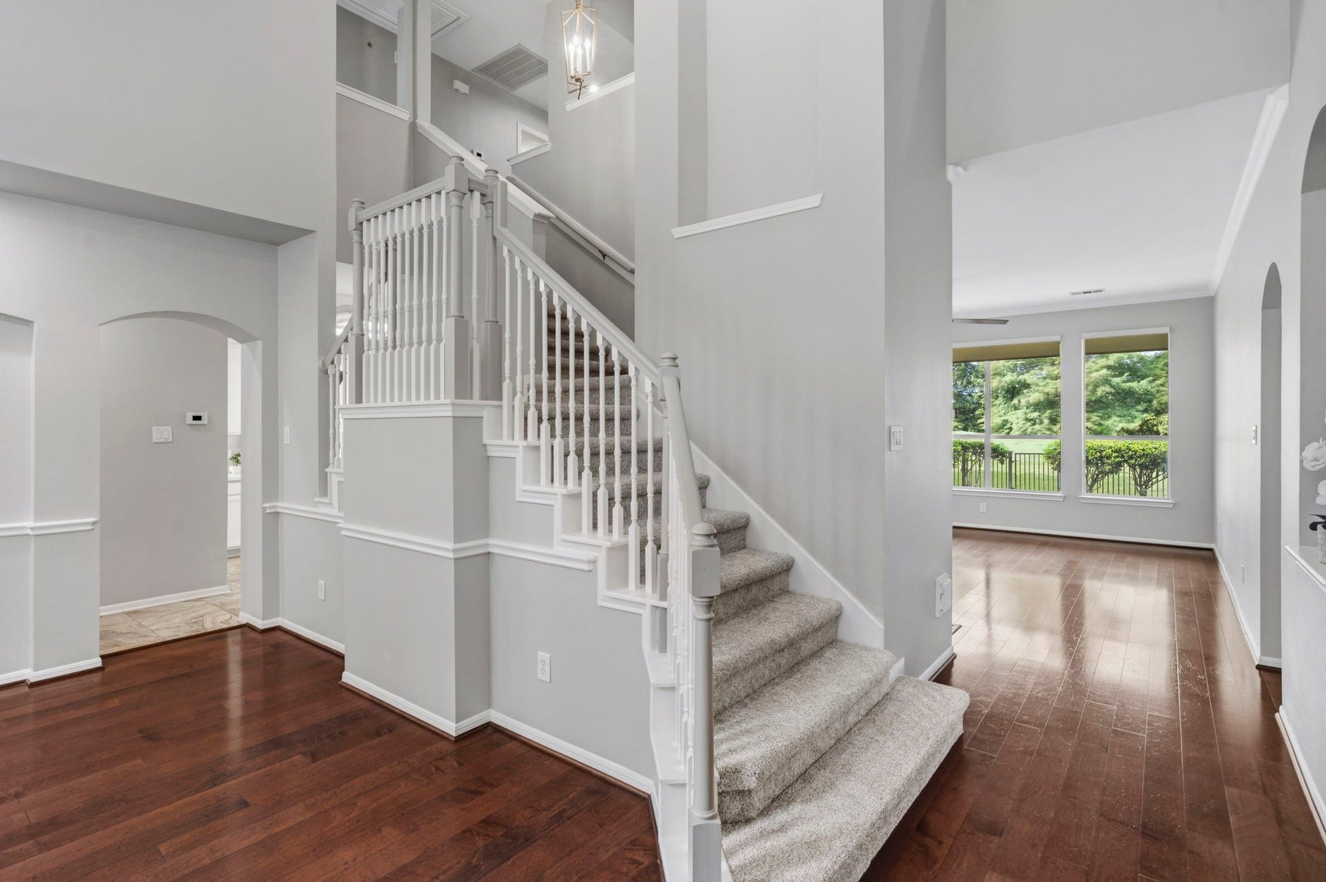 3427 Powell Way, Missouri City, TX 77459 Open foyer highlighted by architectural details and natural light.