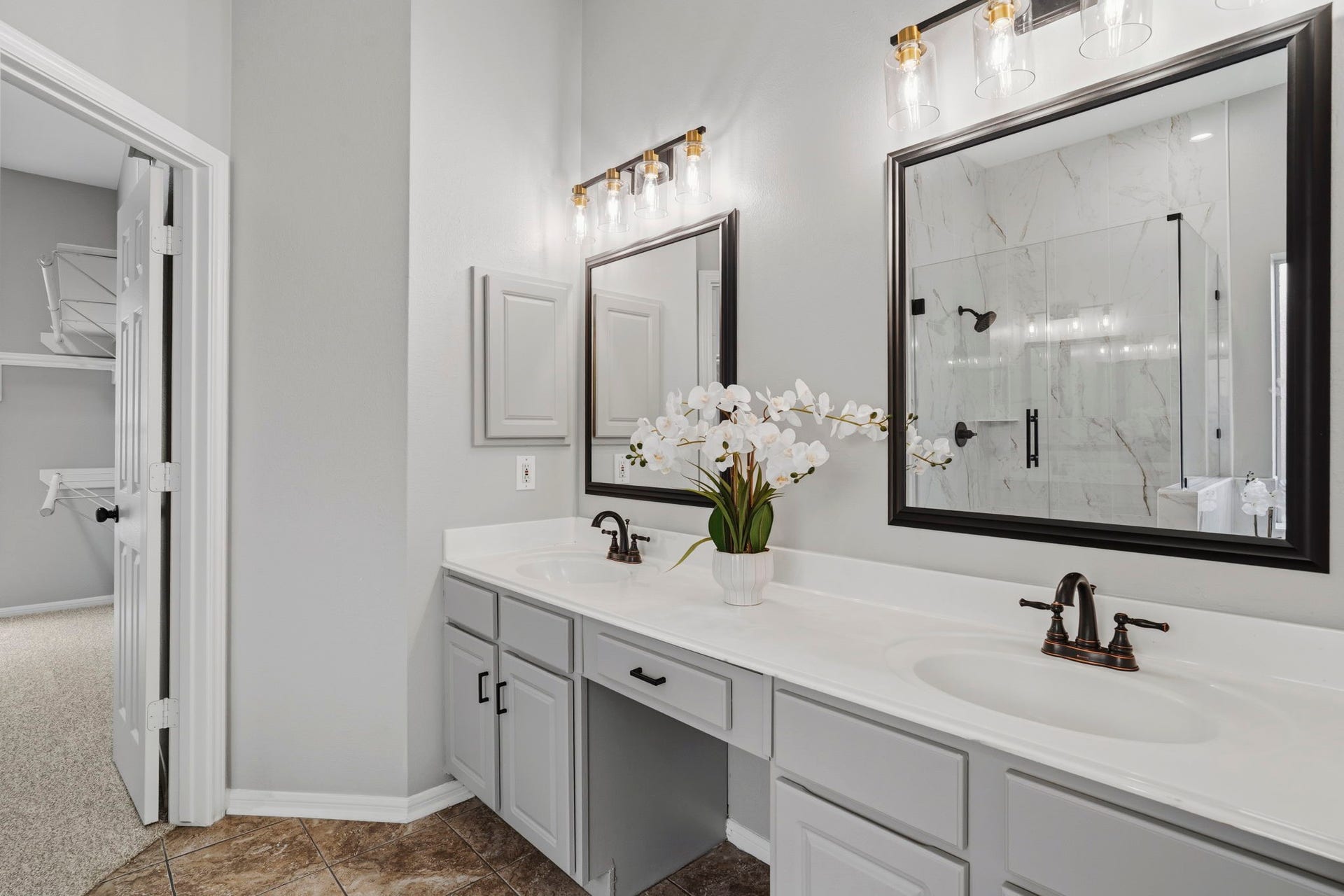 3427 Powell Way, Missouri City, TX 77459 Expansive dual vanity with generous counter space and storage.