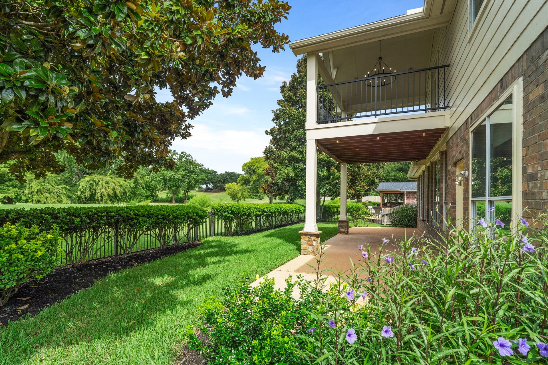 3427 Powell Way, Missouri City, TX 77459 Beautifully maintained backyard with covered outdoor living areas.