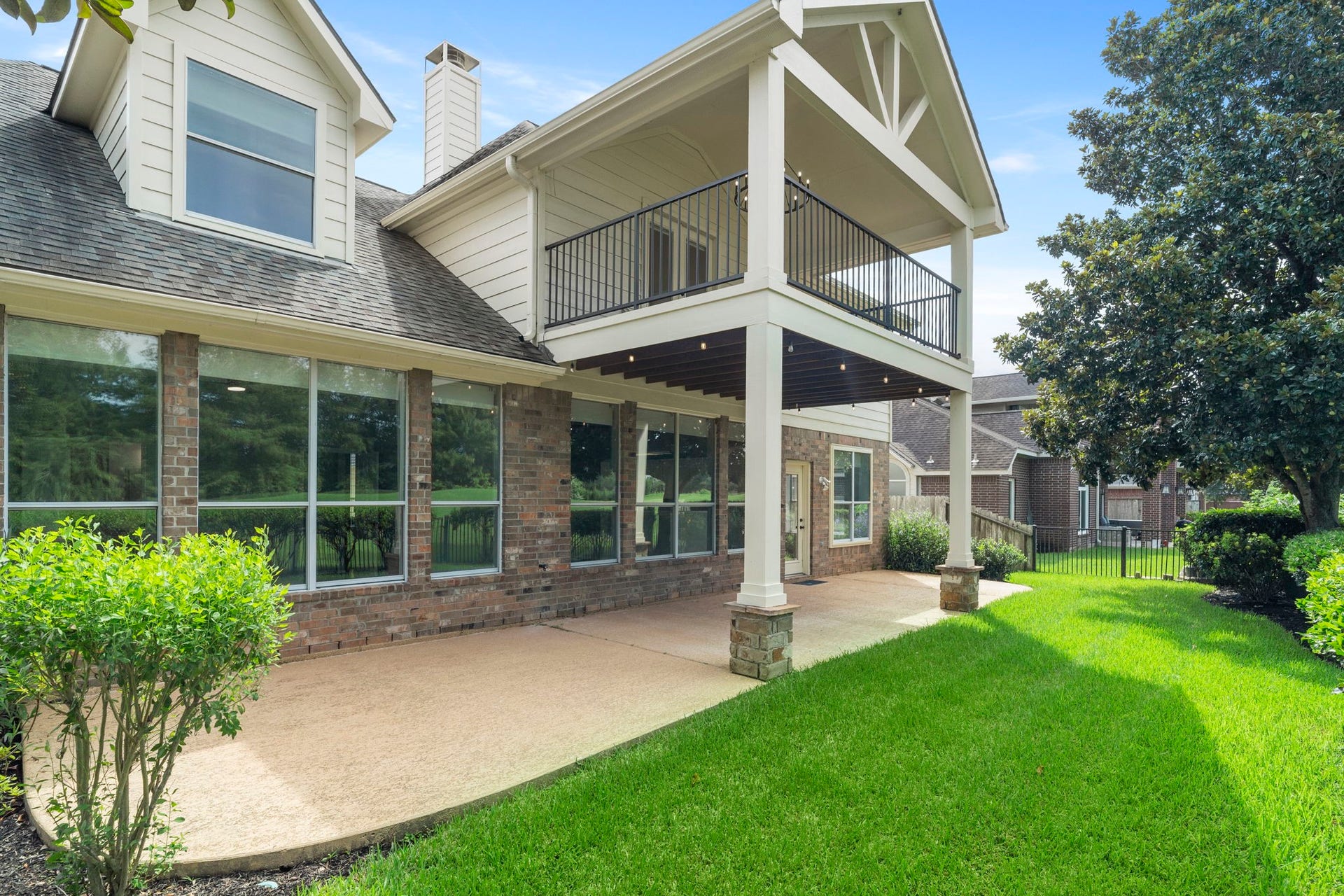 3427 Powell Way, Missouri City, TX 77459 Impressive rear exterior with stacked covered patios.