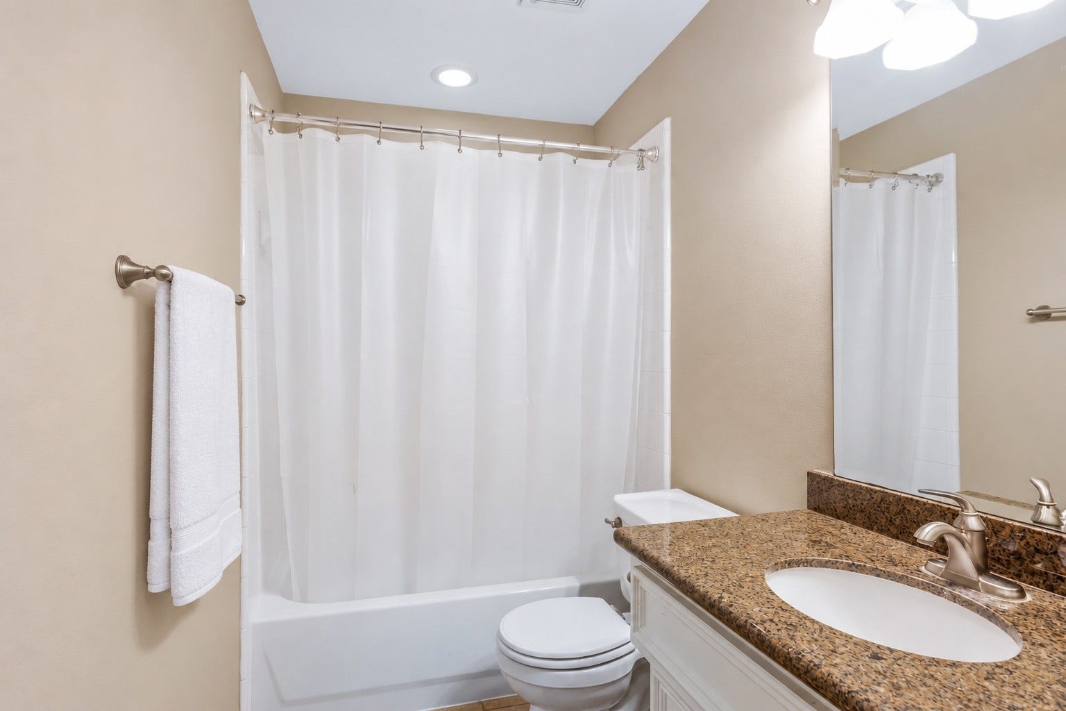 2615 W Dallas Street, Houston, TX 77019 1st level bathroom with tub/shower, granite countertops