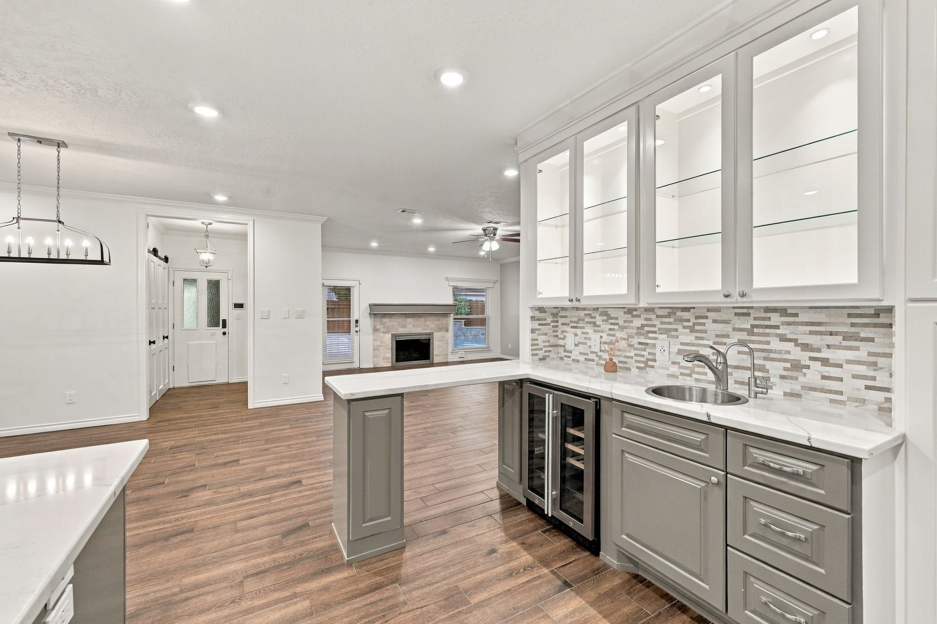 1430 Stependale Drive, Katy, TX 77450 Expansive kitchen with generous counter space, a central island, stainless steel appliances, and open living areas.