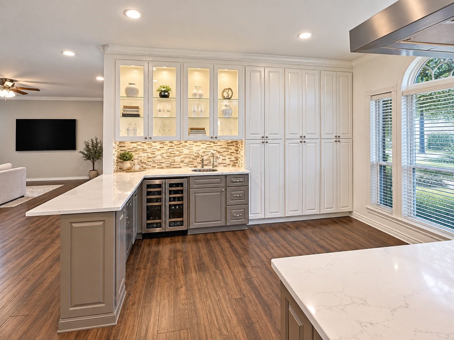 1430 Stependale Drive, Katy, TX 77450 Bright kitchen area with extensive cabinetry, modern countertops, a stylish backsplash, and natural light.