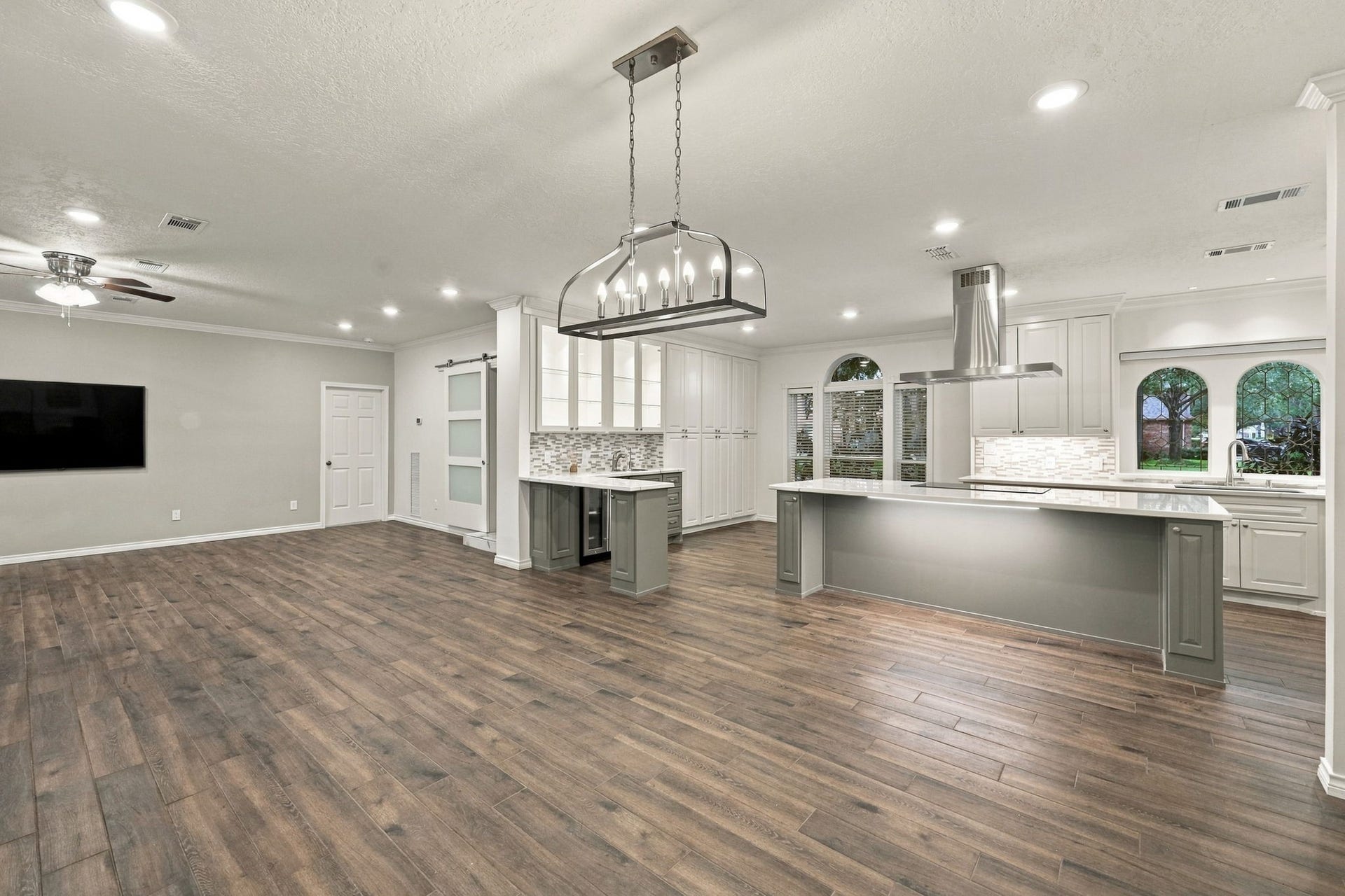 1430 Stependale Drive, Katy, TX 77450 Spacious open-concept layout connecting the updated kitchen with the adjoining living area.