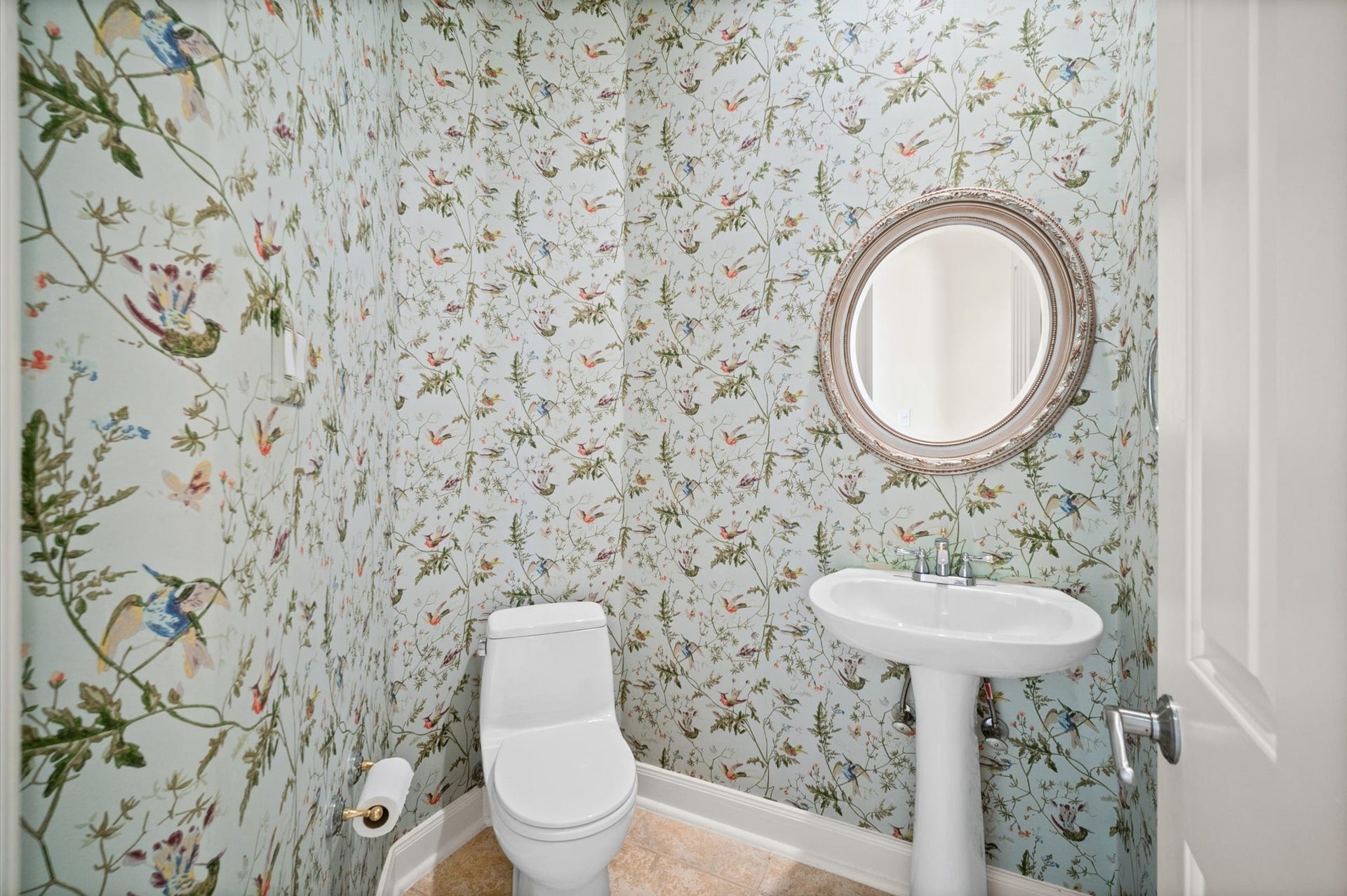 3010 Bonnebridge Way Boulevard, Houston, TX 77082 The powder room brings a touch of personality with its botanical wallcovering, classic pedestal sink, and understated detailsa delightful space for guests