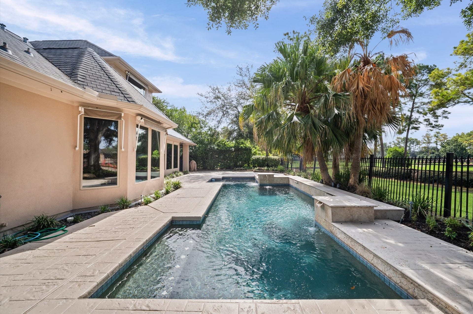 3010 Bonnebridge Way Boulevard, Houston, TX 77082 Enjoy the pool with the 1st fairway as your backdrop, plus triple-pane windows for added comfort and efficiency and a full mosquito mist system designed for more enjoyable outdoor living.