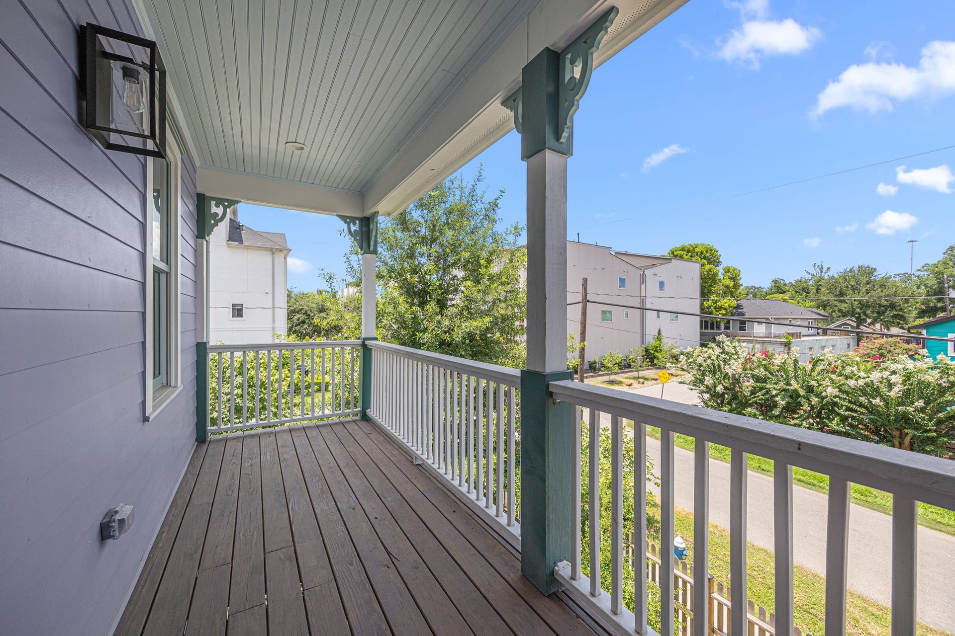 The wide 2nd floor balcony offers additional outdoor space for relaxing.