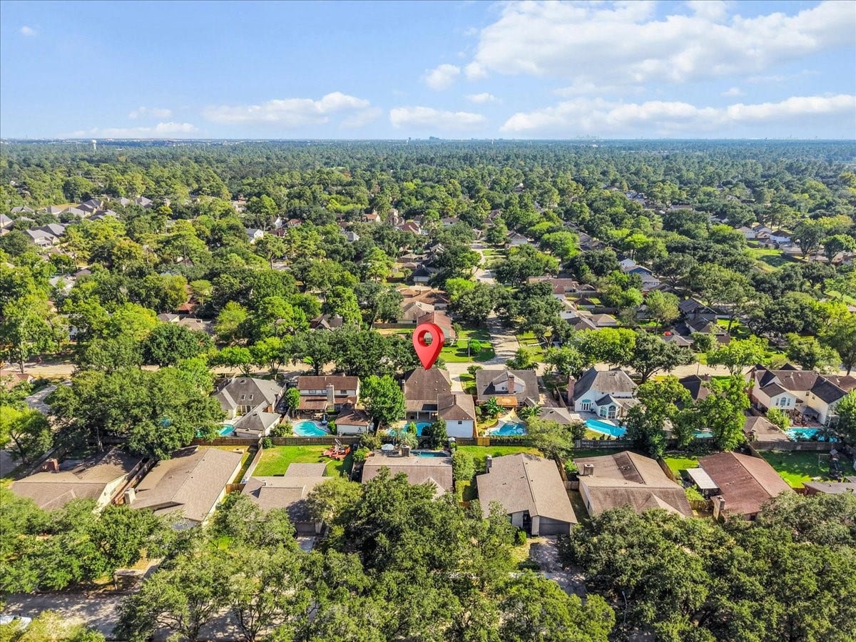 Charming suburban neighborhood with lush greenery, offering a tranquil setting and spacious homes.