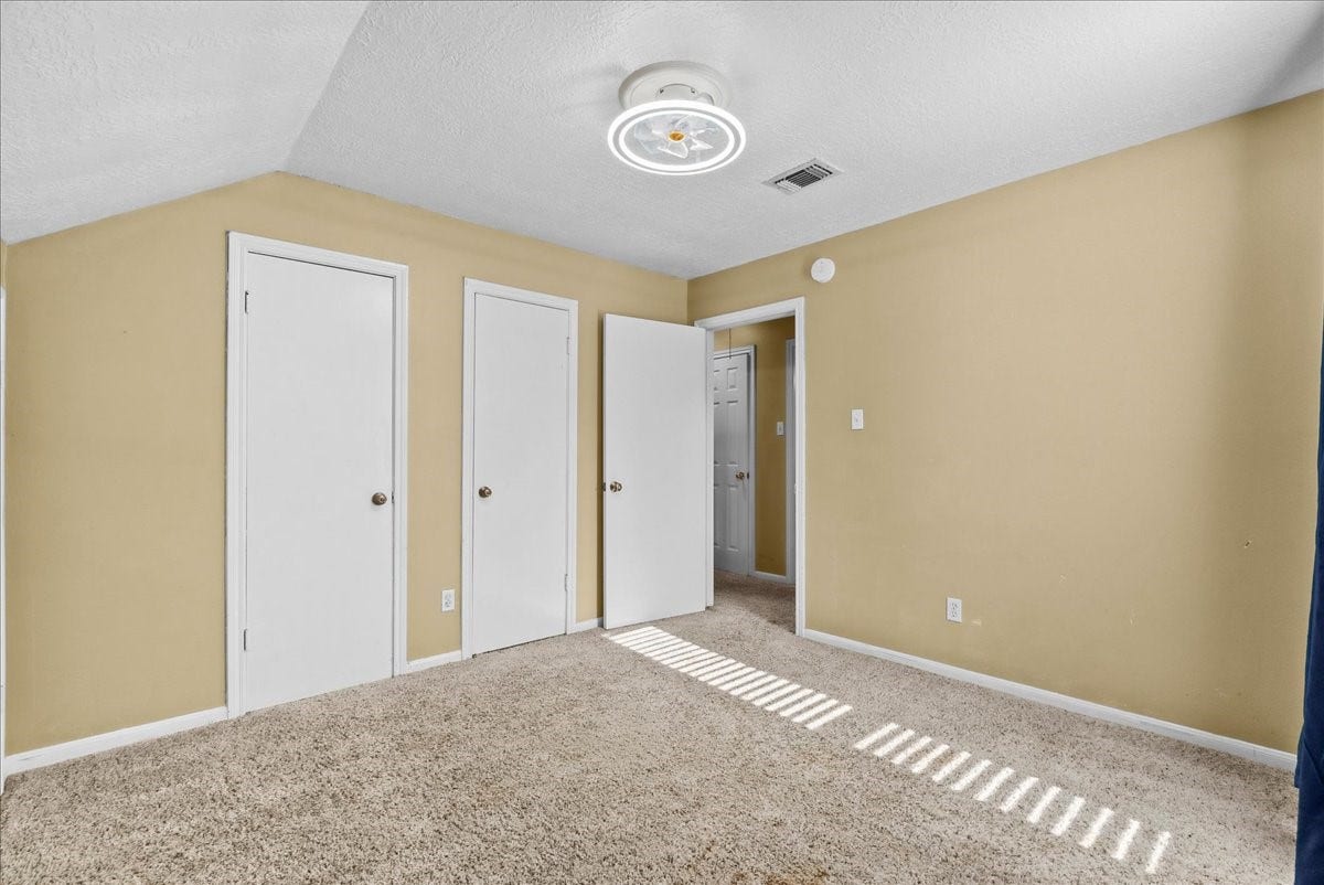 Cozy and inviting, the third bedroom offers ample space and natural light, creating the perfect retreat for rest and relaxation.