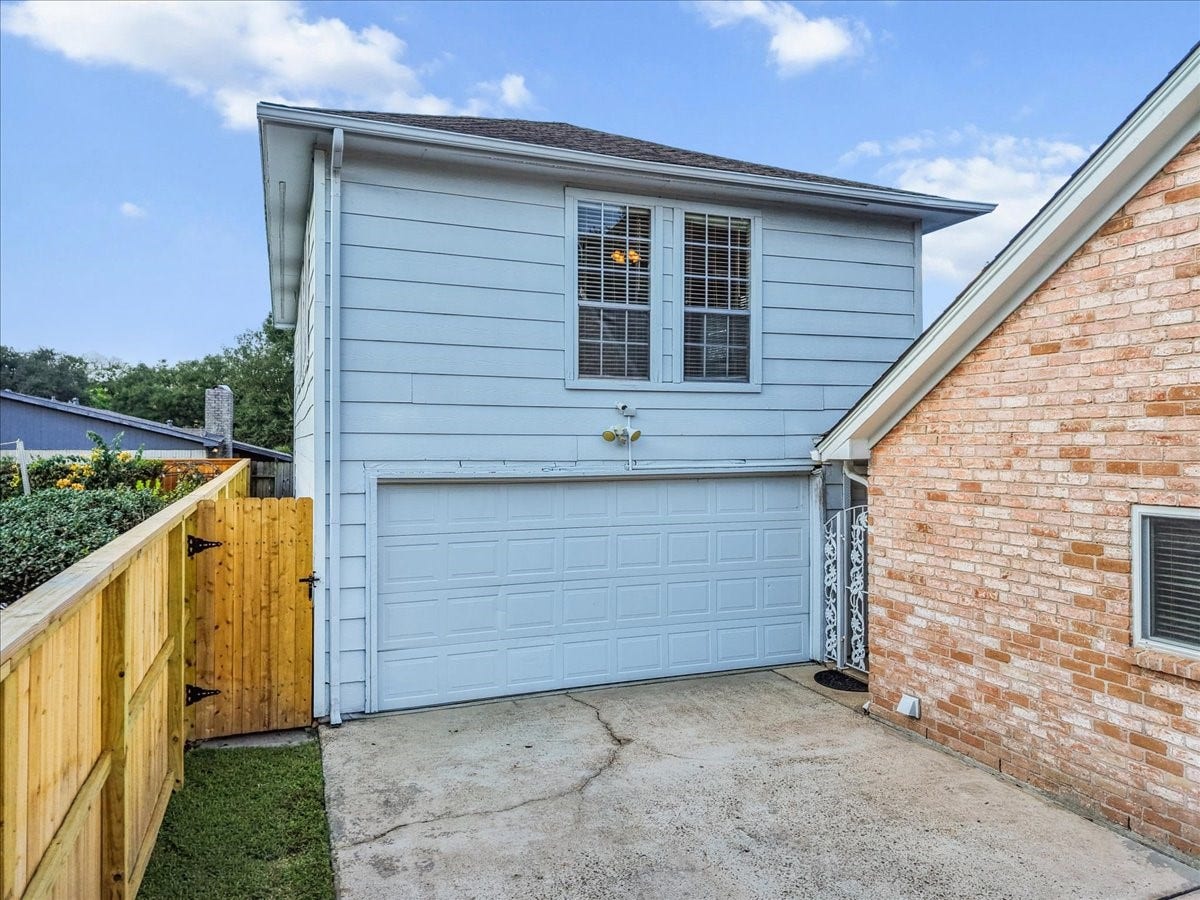 Discover versatile living with this charming garage apartment, offering both functionality and extra space for guests or potential rental income.