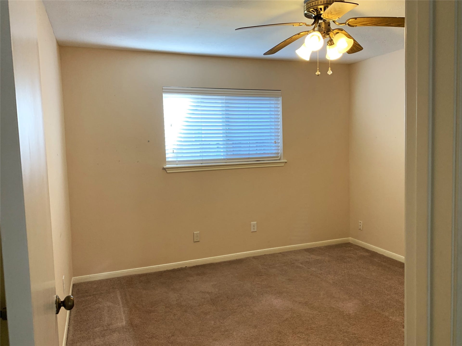 bedroom with door to hall bath