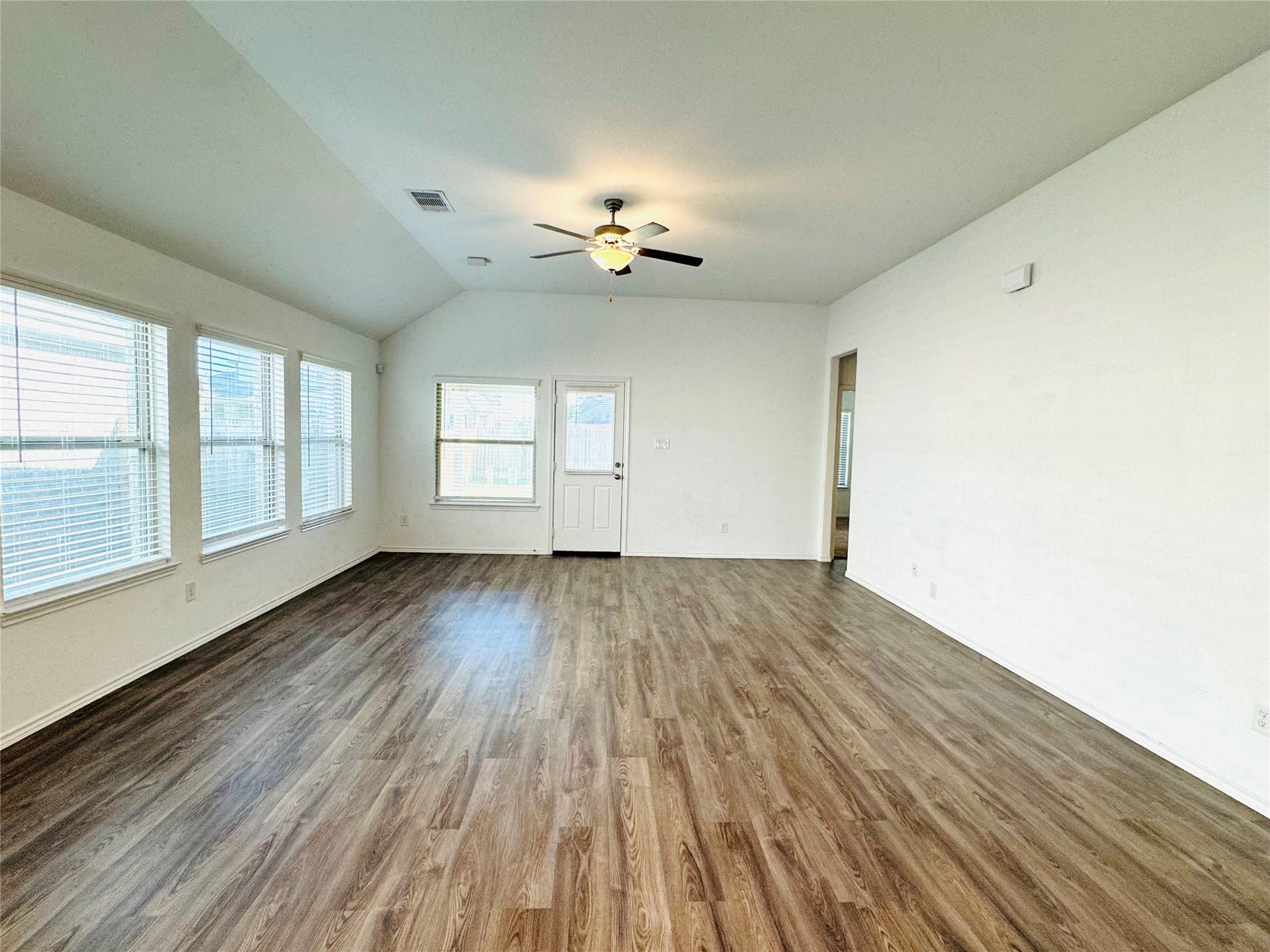3535 Britton Burrow Way, Richmond, TX 77406 Living room with luxury vinyl and ceiling fan